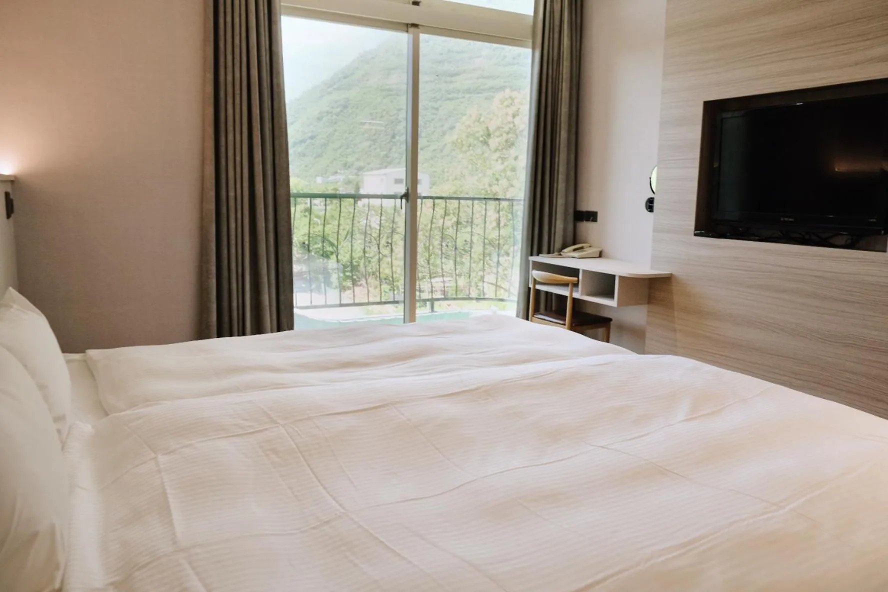 Bed in Hoping Mori Hotel