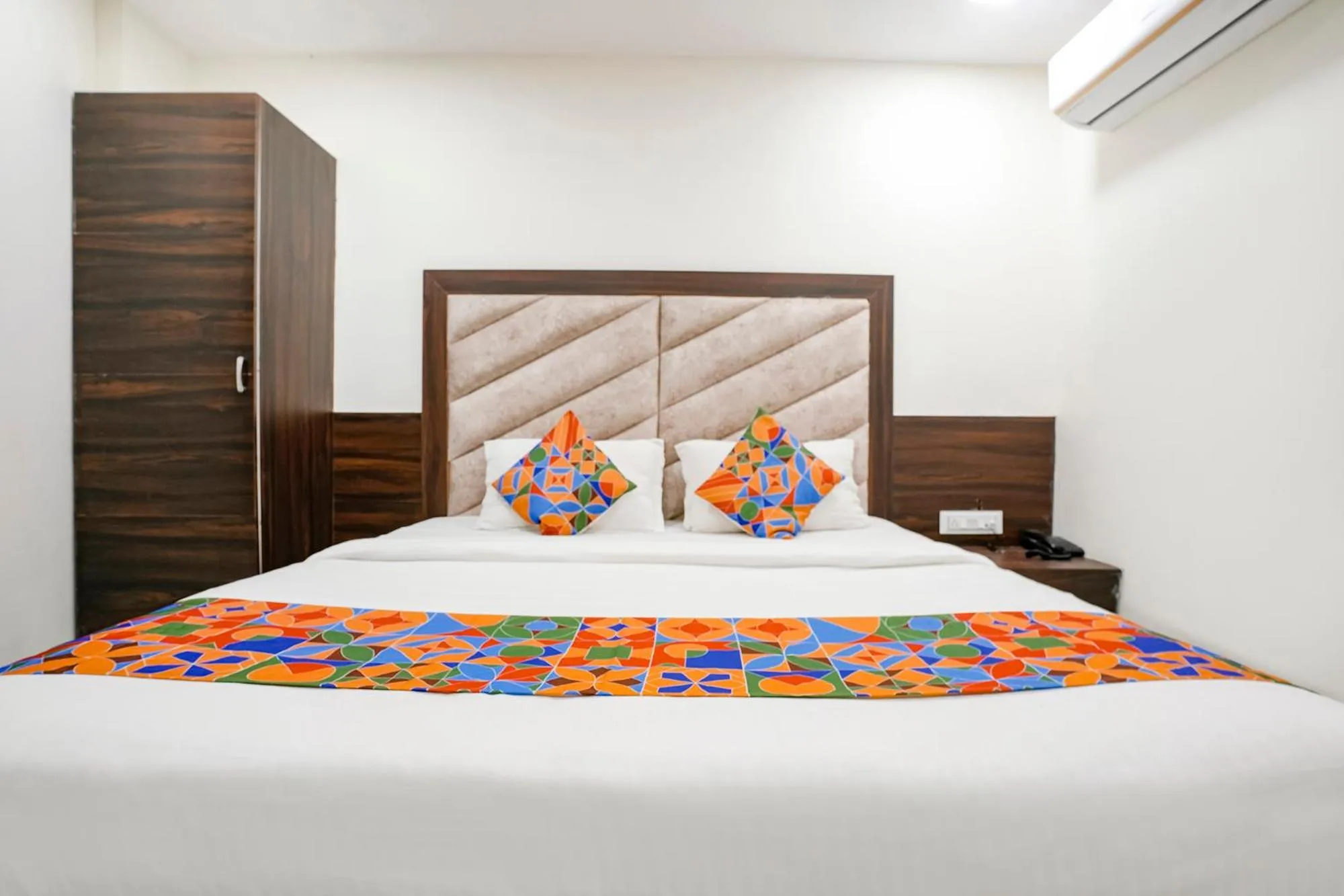 Bed in FabHotel Silver Inn