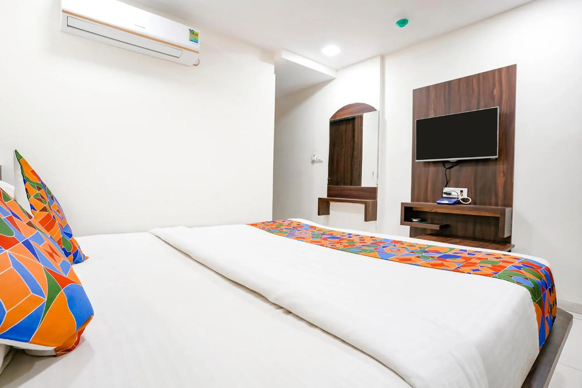 Bed in FabHotel Silver Inn