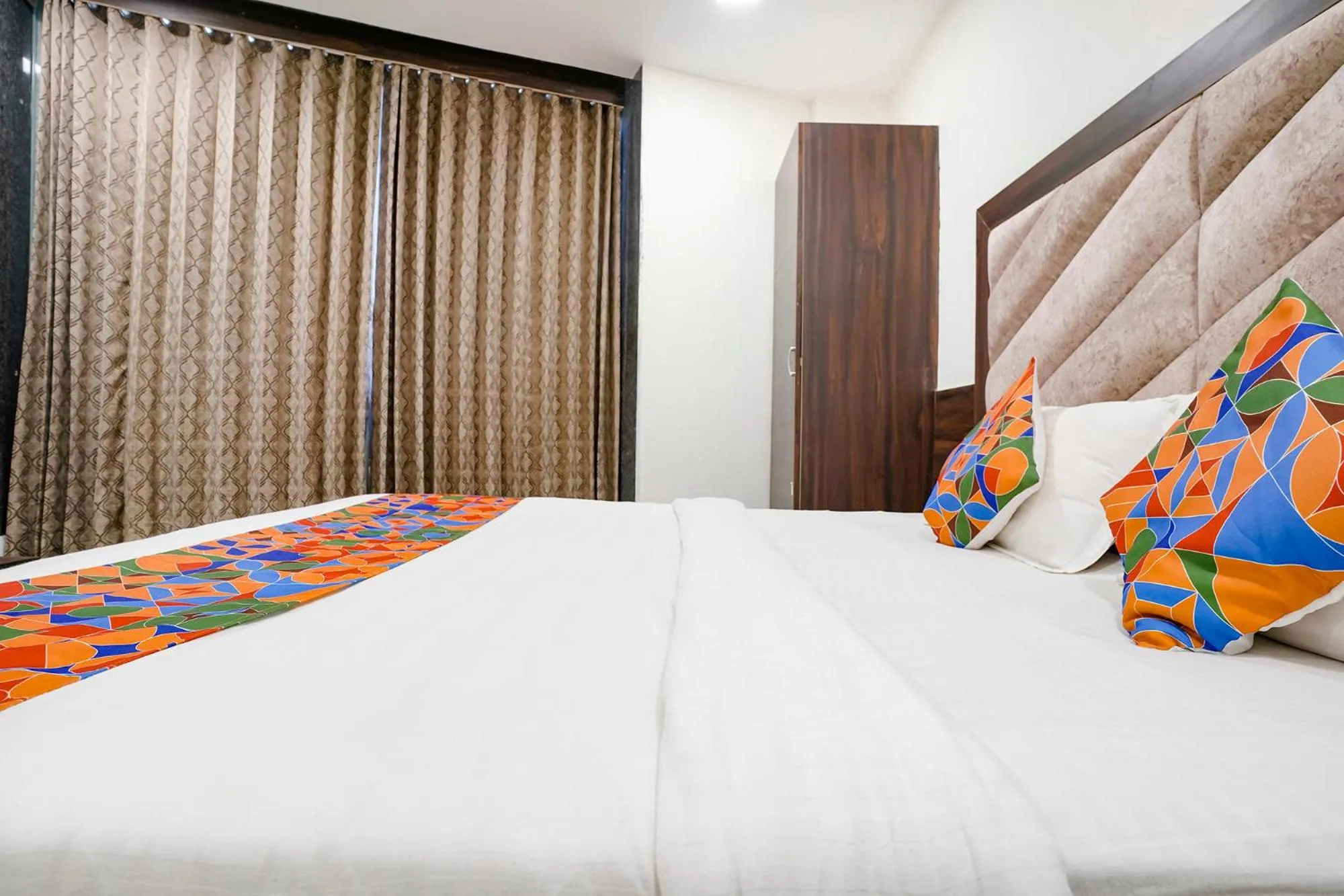 Bed in FabHotel Silver Inn