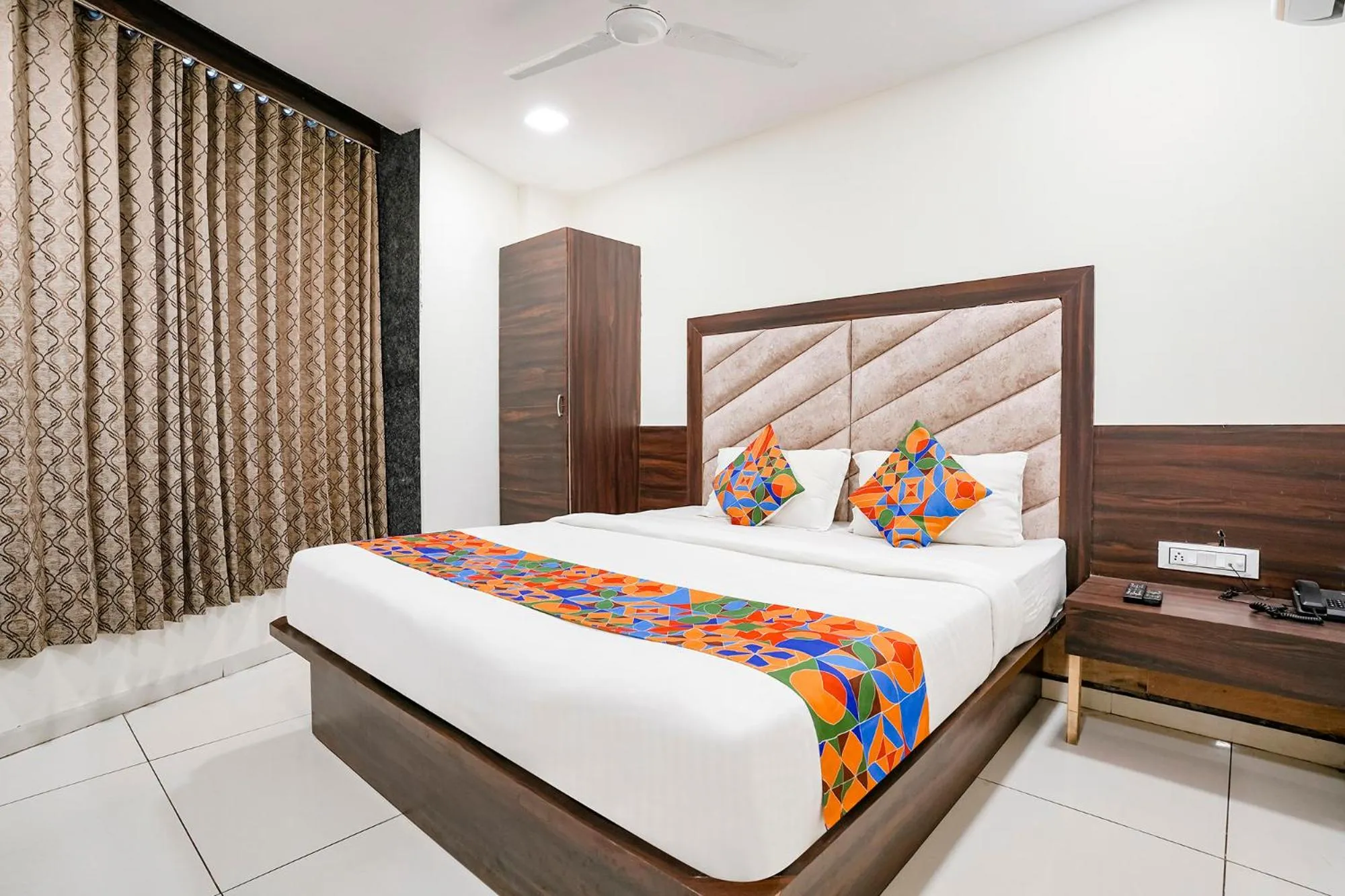 Bed in FabHotel Silver Inn