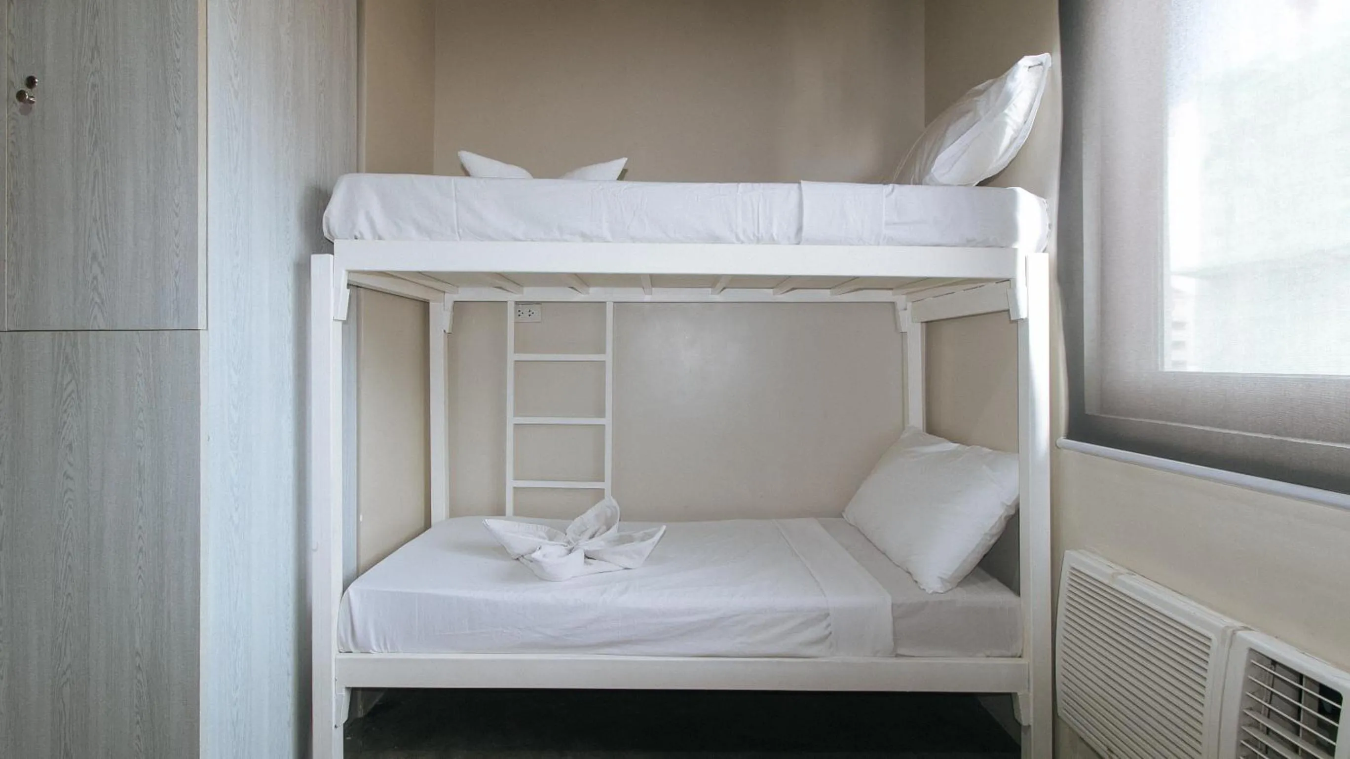 Photo of the whole room in Filmore Suites Makati by RedDoorz