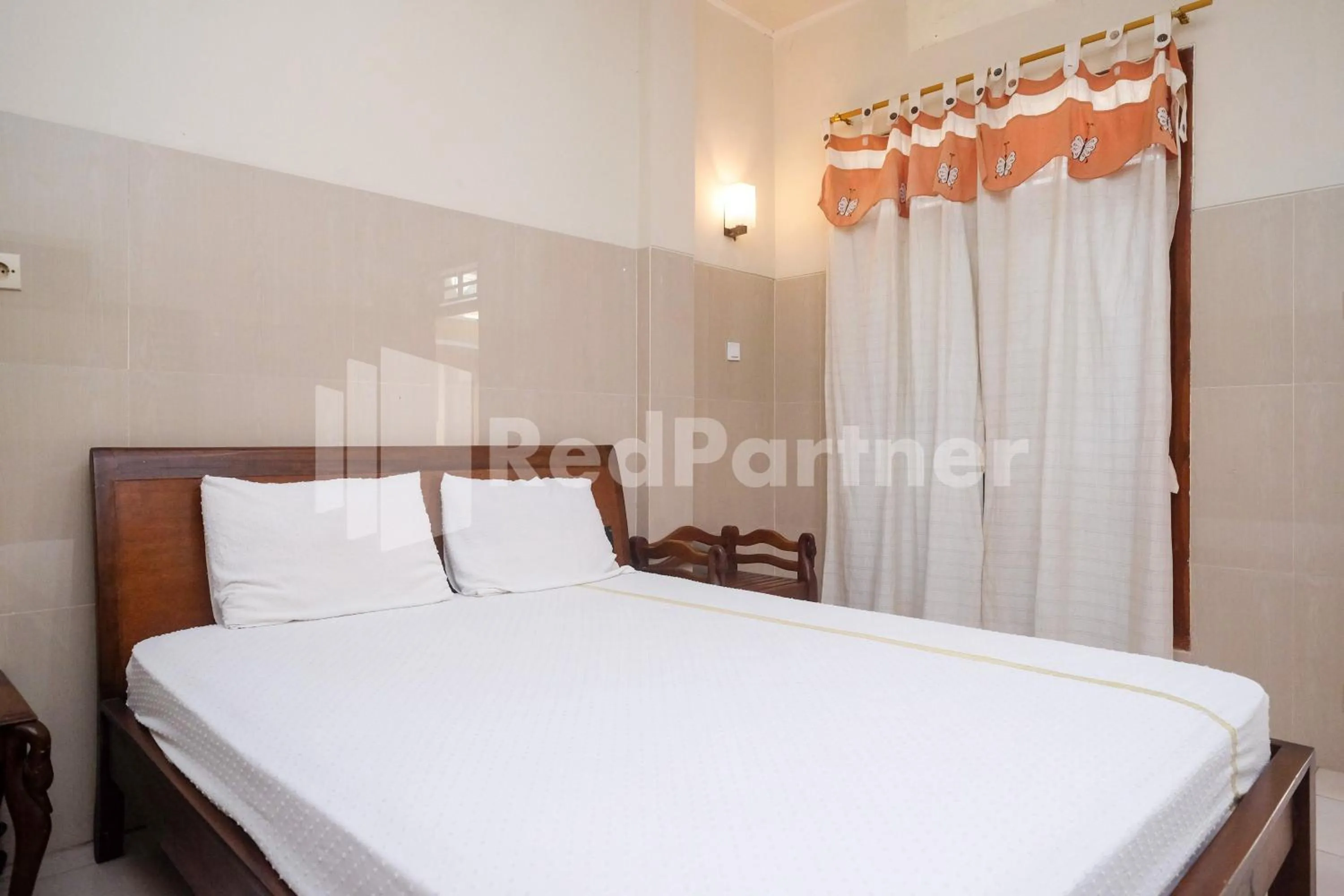 Bed in Wisma Garuda Syariah Condoongcatur Mitra RedDoorz