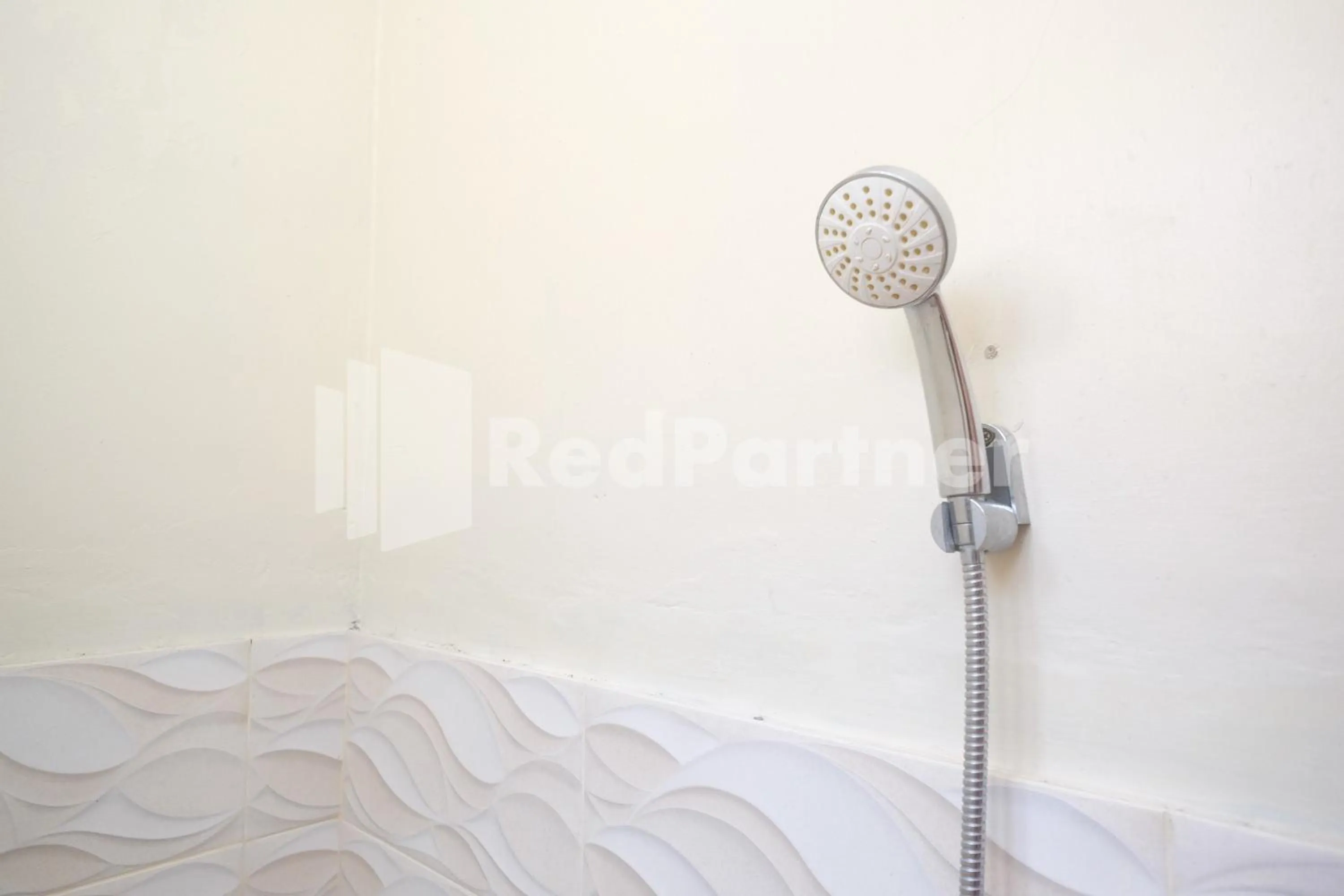 Bathroom in Wisma Garuda Syariah Condoongcatur Mitra RedDoorz