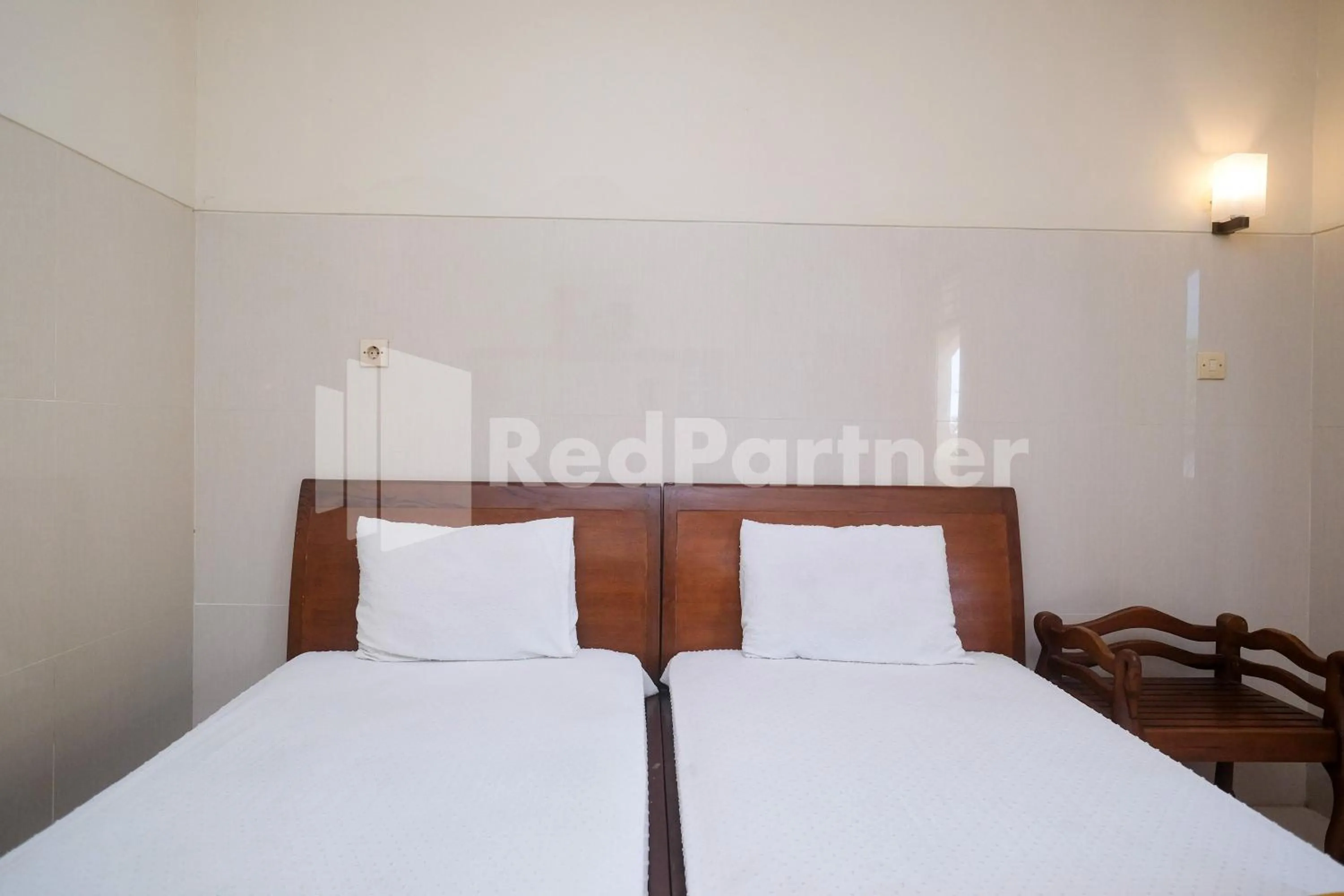 Bed in Wisma Garuda Syariah Condoongcatur Mitra RedDoorz