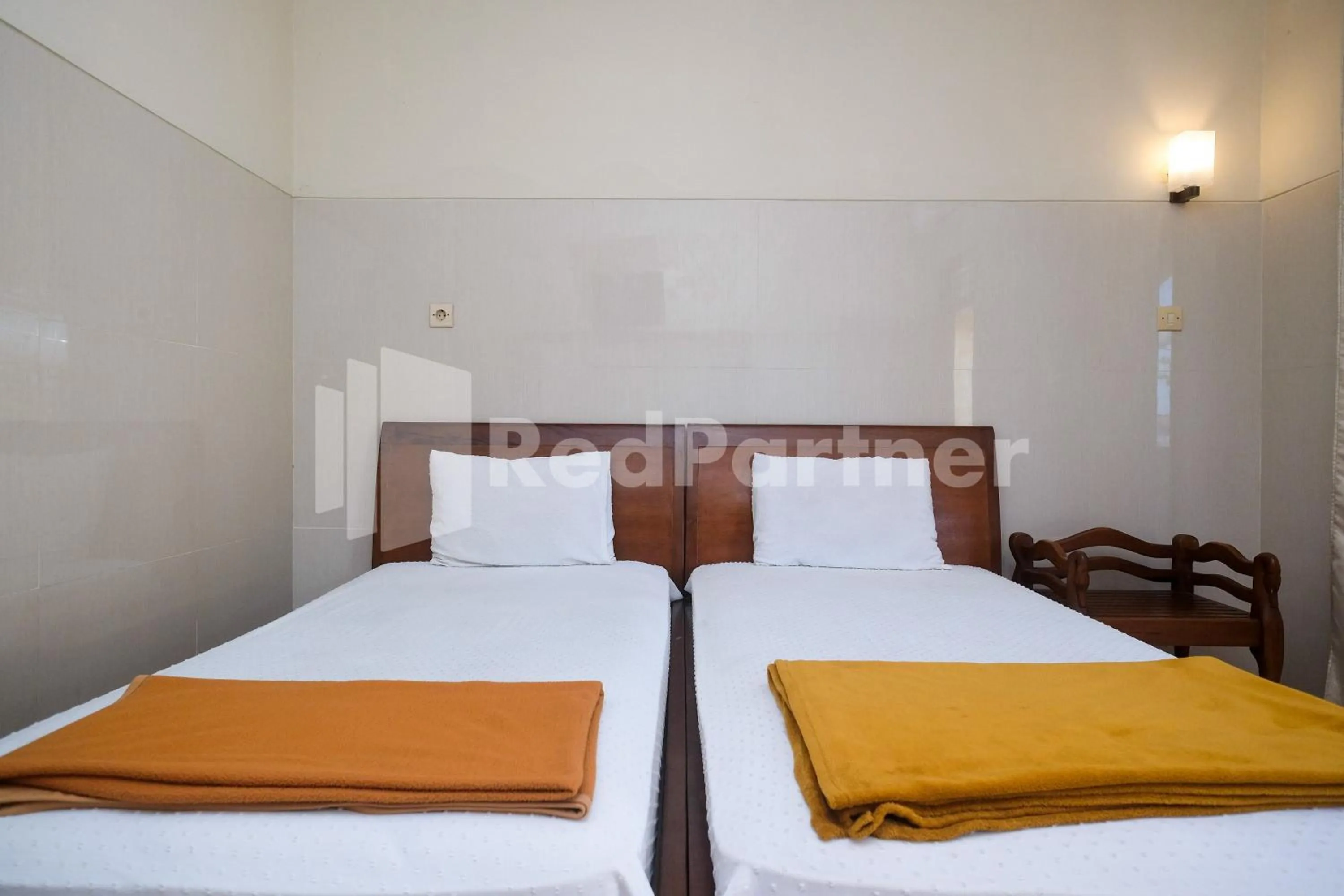 Bed in Wisma Garuda Syariah Condoongcatur Mitra RedDoorz