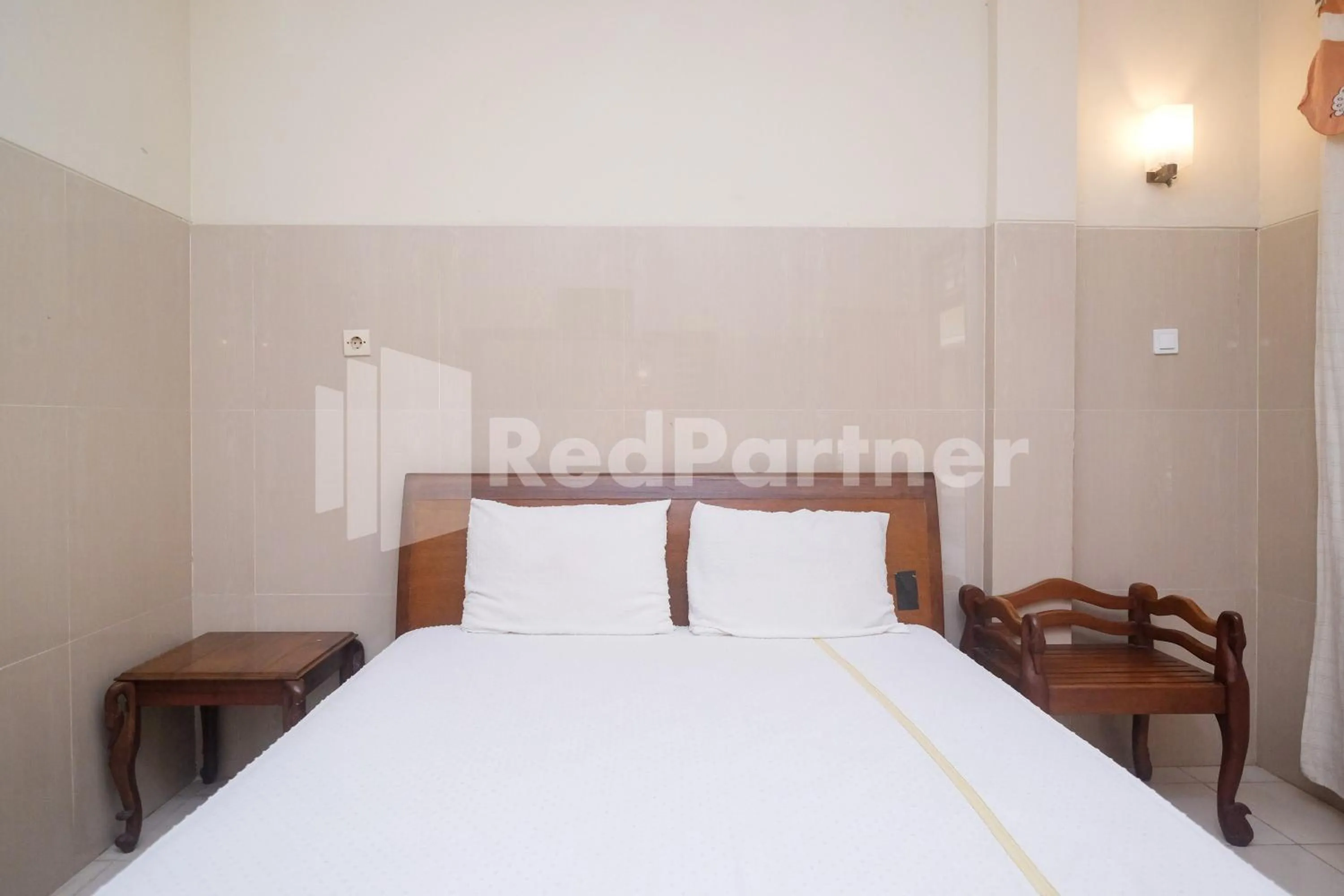 Bed in Wisma Garuda Syariah Condoongcatur Mitra RedDoorz