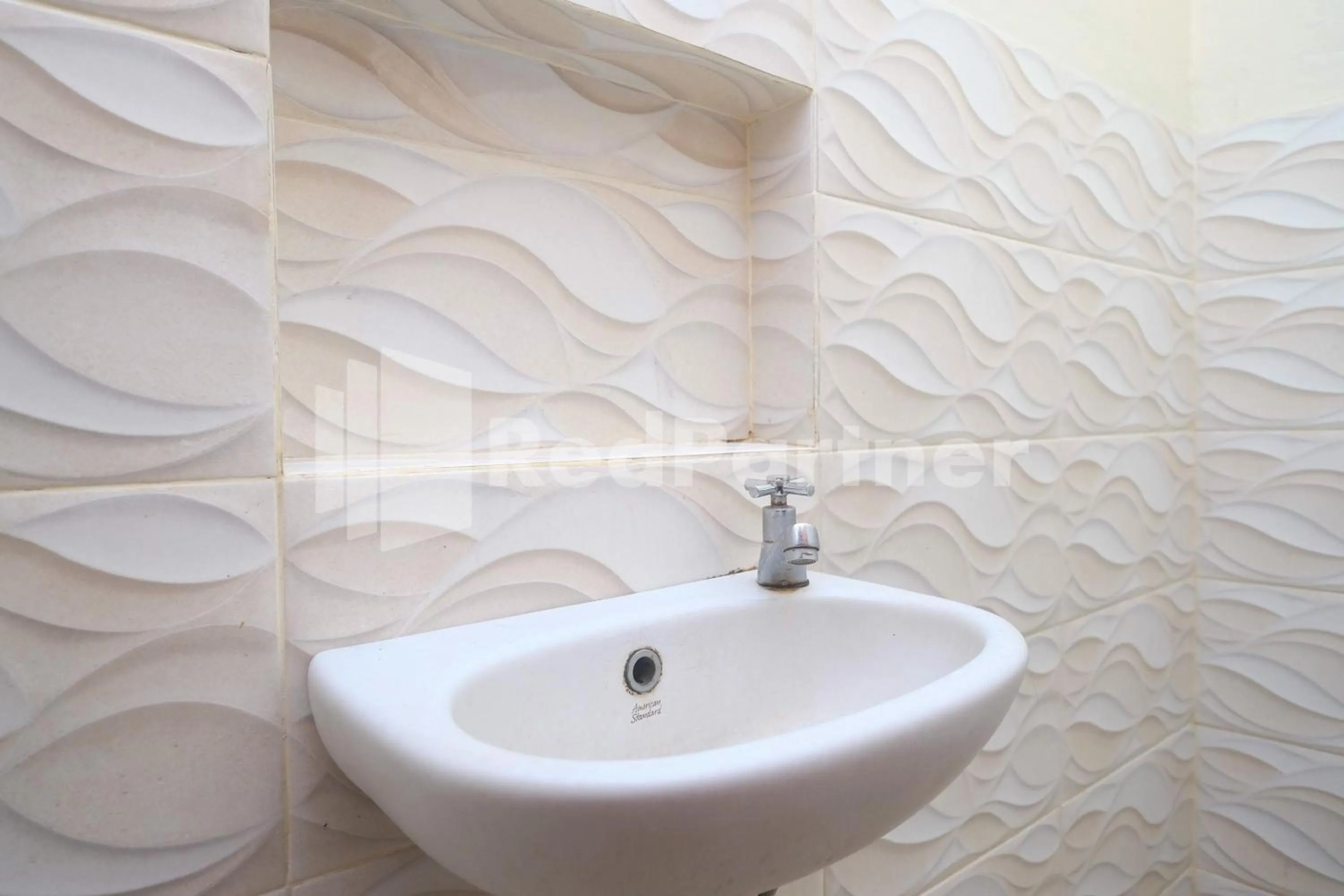 Bathroom in Wisma Garuda Syariah Condoongcatur Mitra RedDoorz