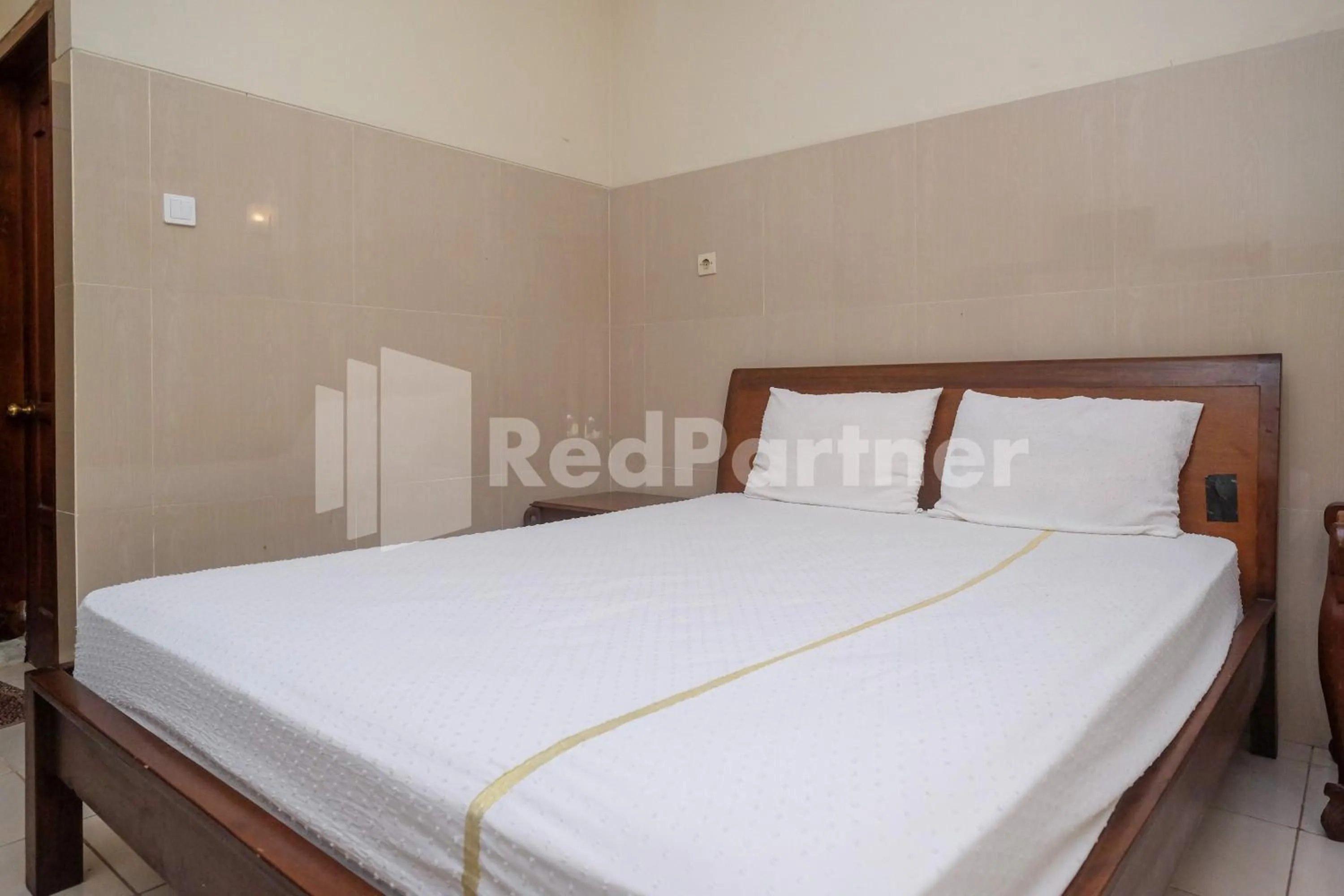 Bed in Wisma Garuda Syariah Condoongcatur Mitra RedDoorz