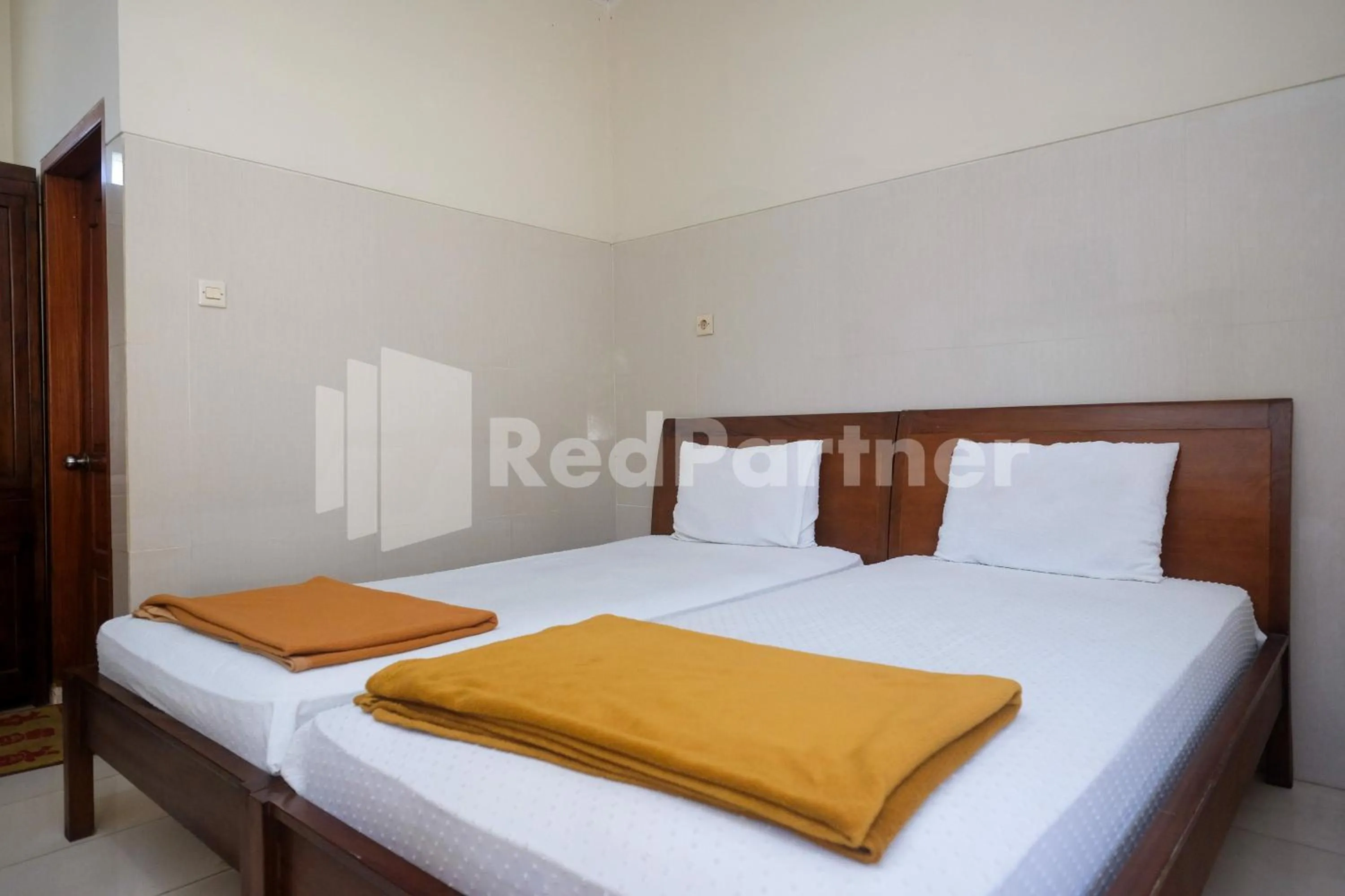 Bed in Wisma Garuda Syariah Condoongcatur Mitra RedDoorz