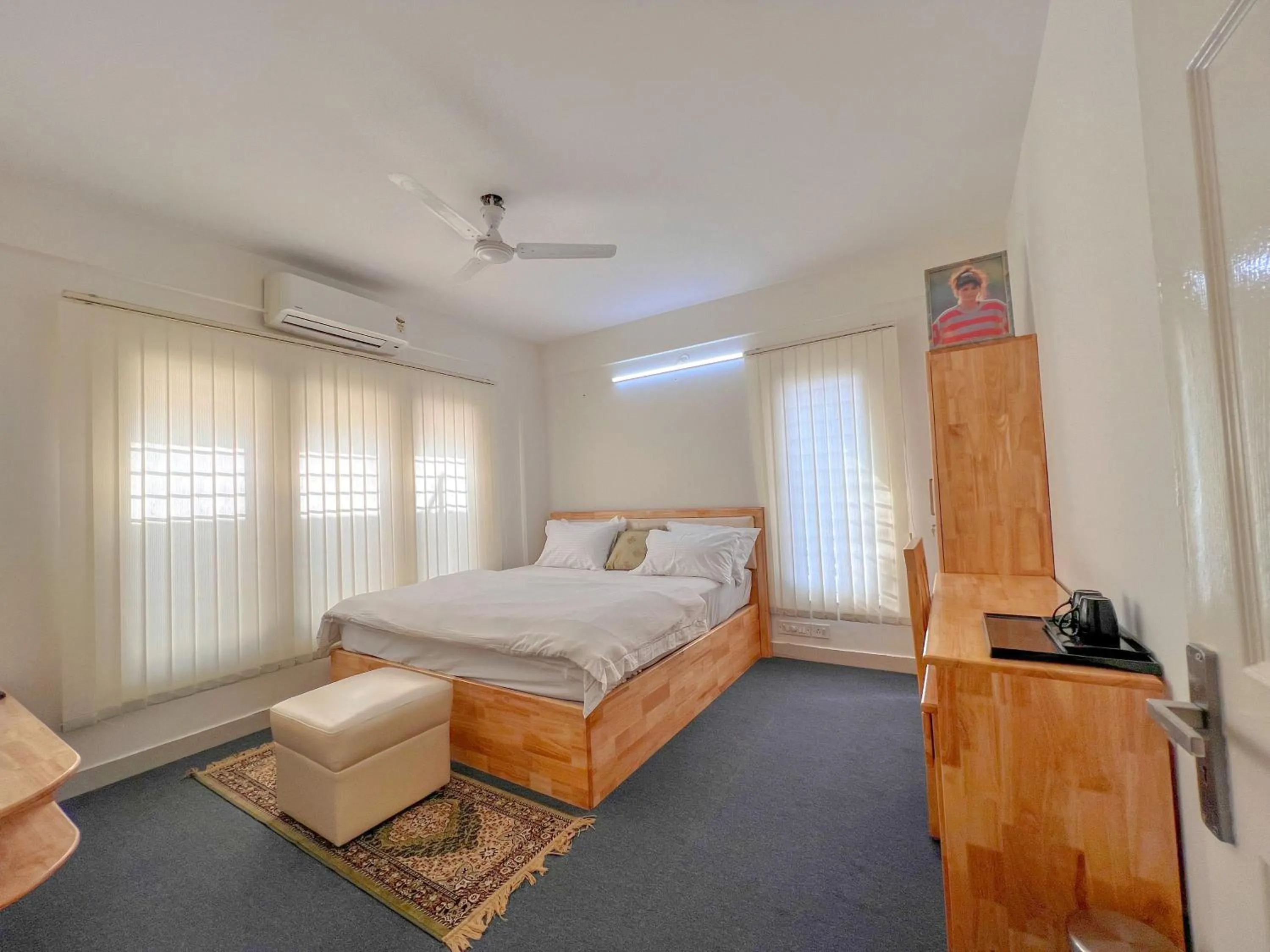 Bed in Windfall Service Apartment