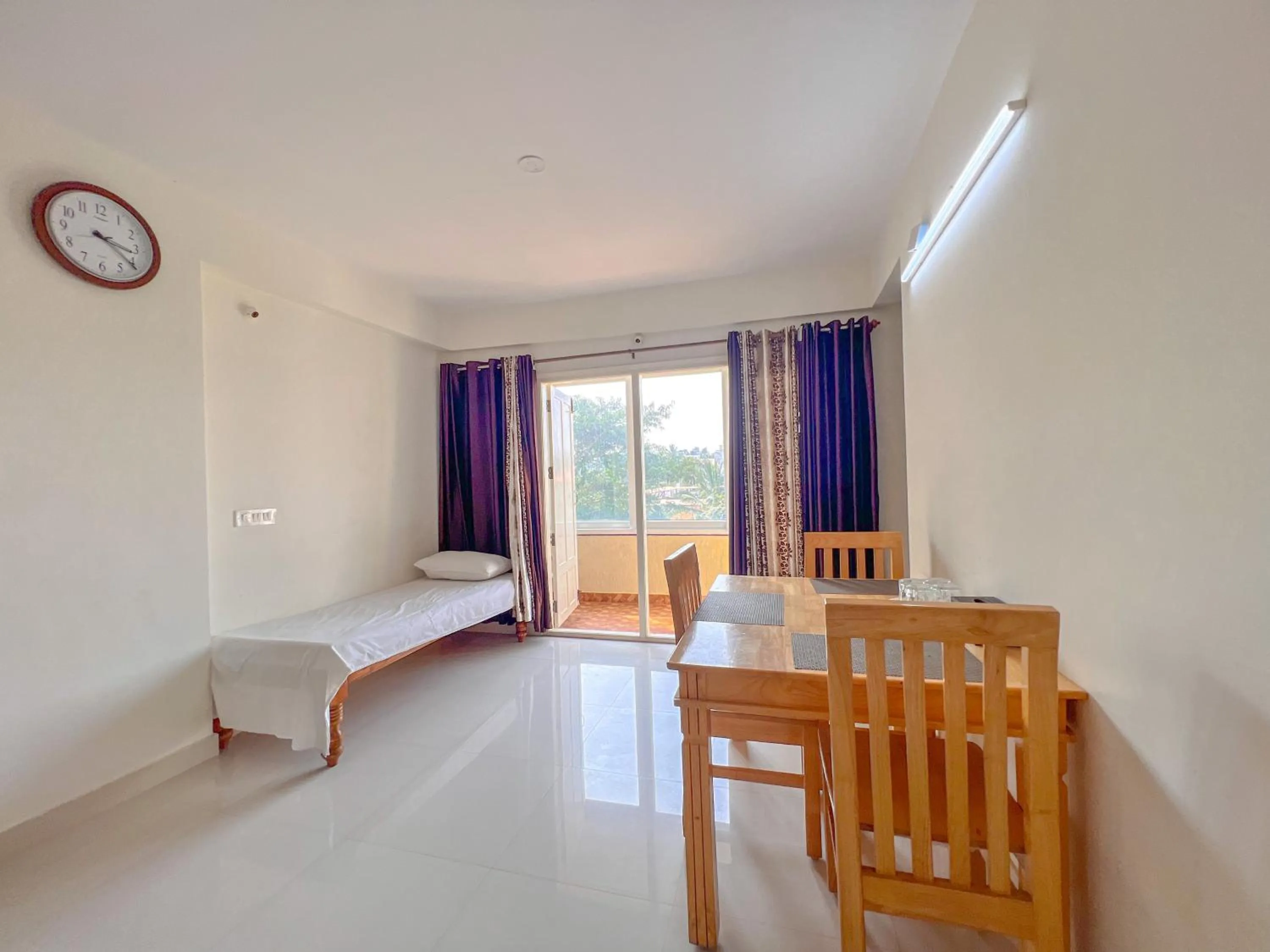 Bed in Windfall Service Apartment