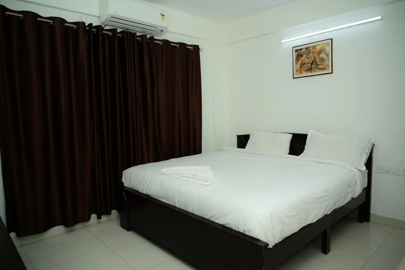 Bed in Windfall Service Apartment