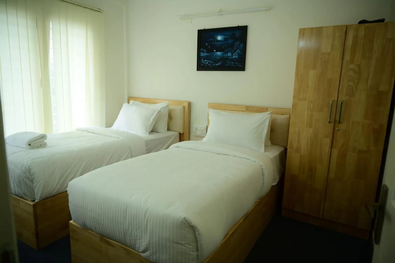 Bed in Windfall Service Apartment