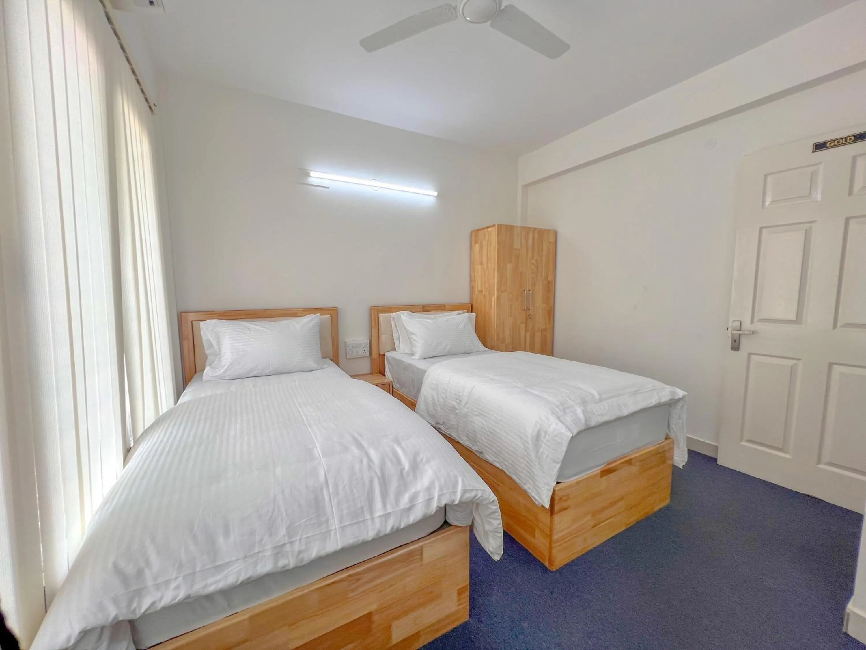 Bed in Windfall Service Apartment