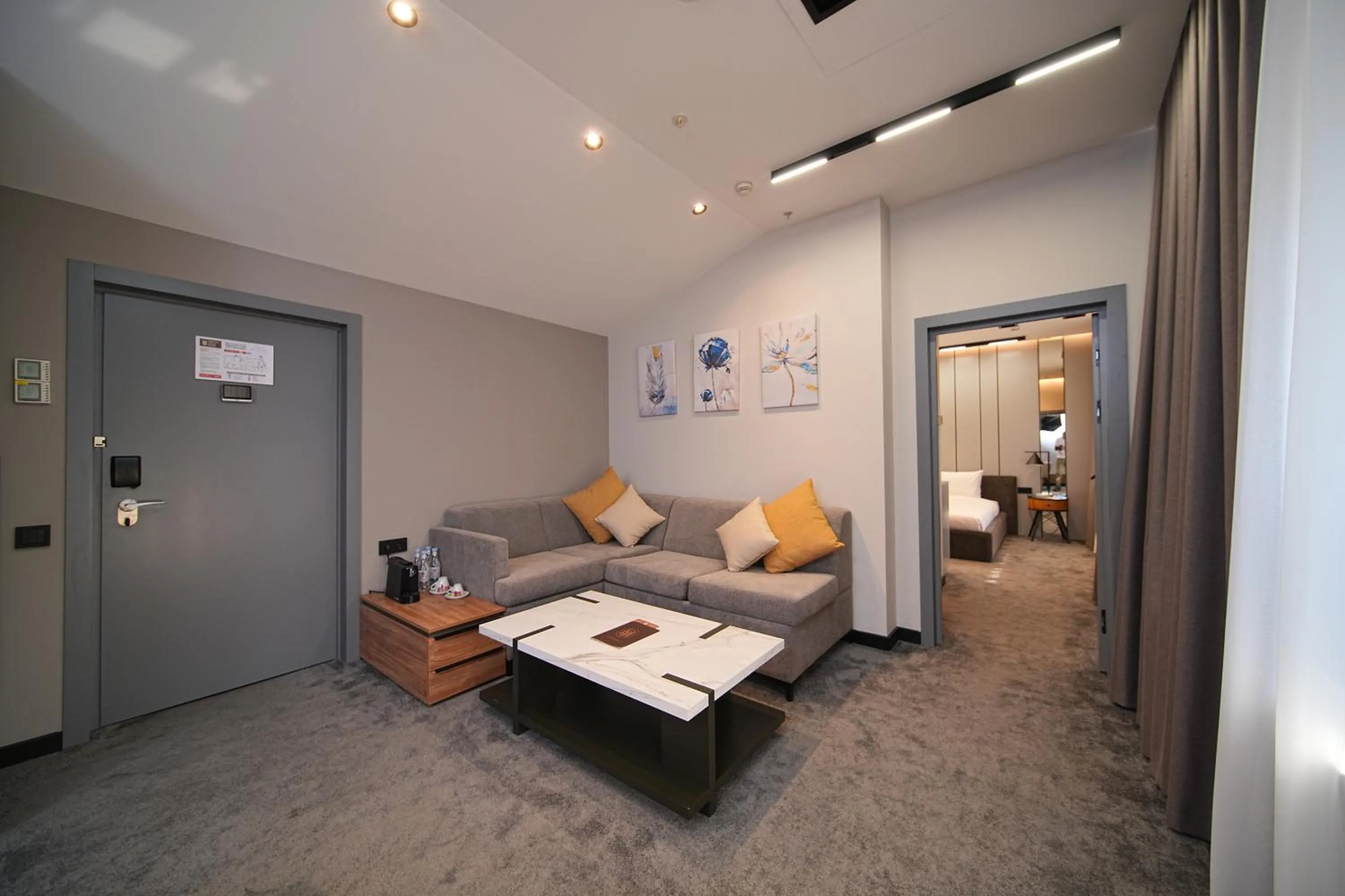 Living room, Bed in Yerevan Place Hotel