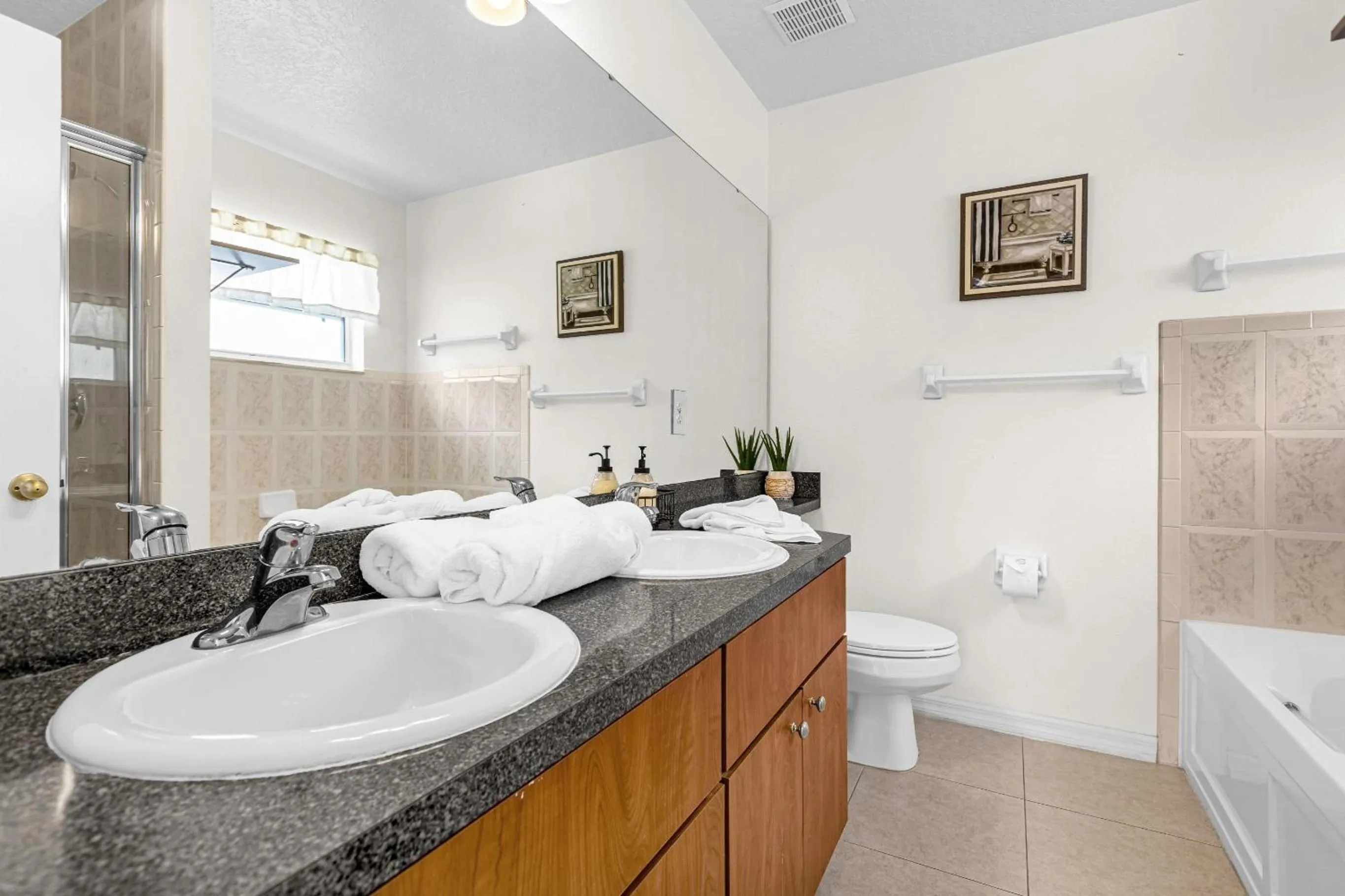 Bathroom in Disney Area 4BR Home with Heated Private Pool