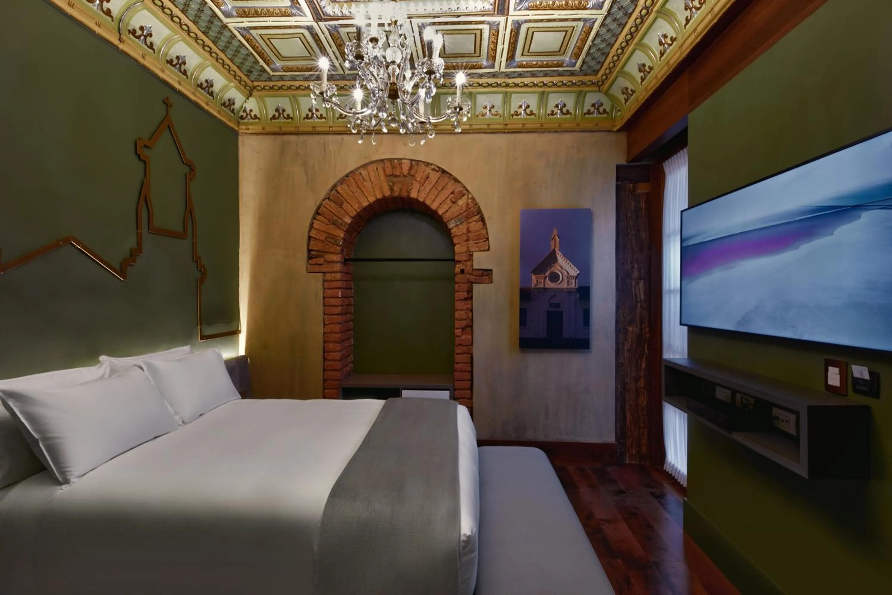 TV and multimedia in Casa Firenza Hotel & Suites Boutique