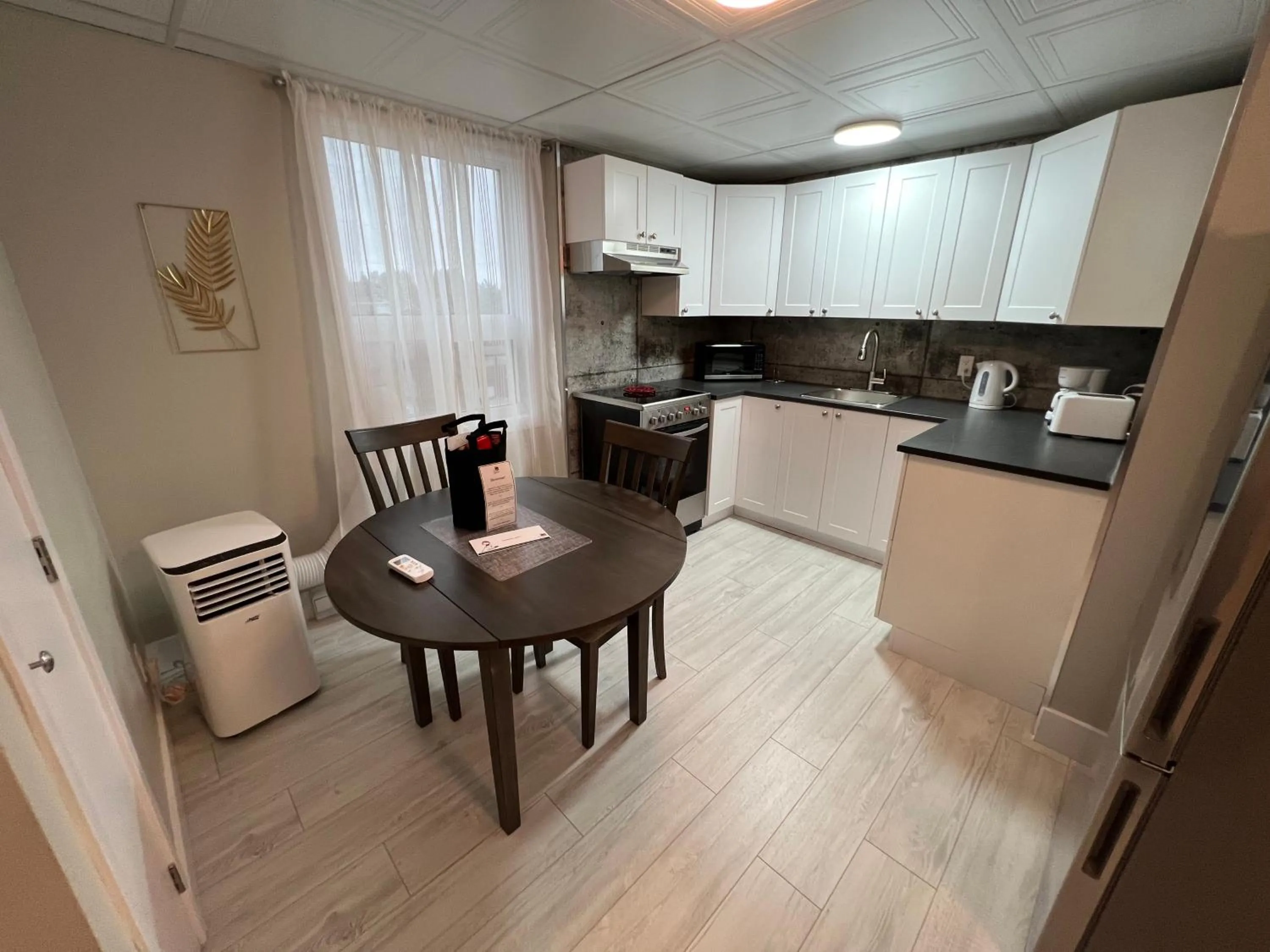 Kitchen or kitchenette in Le Centre-Ville