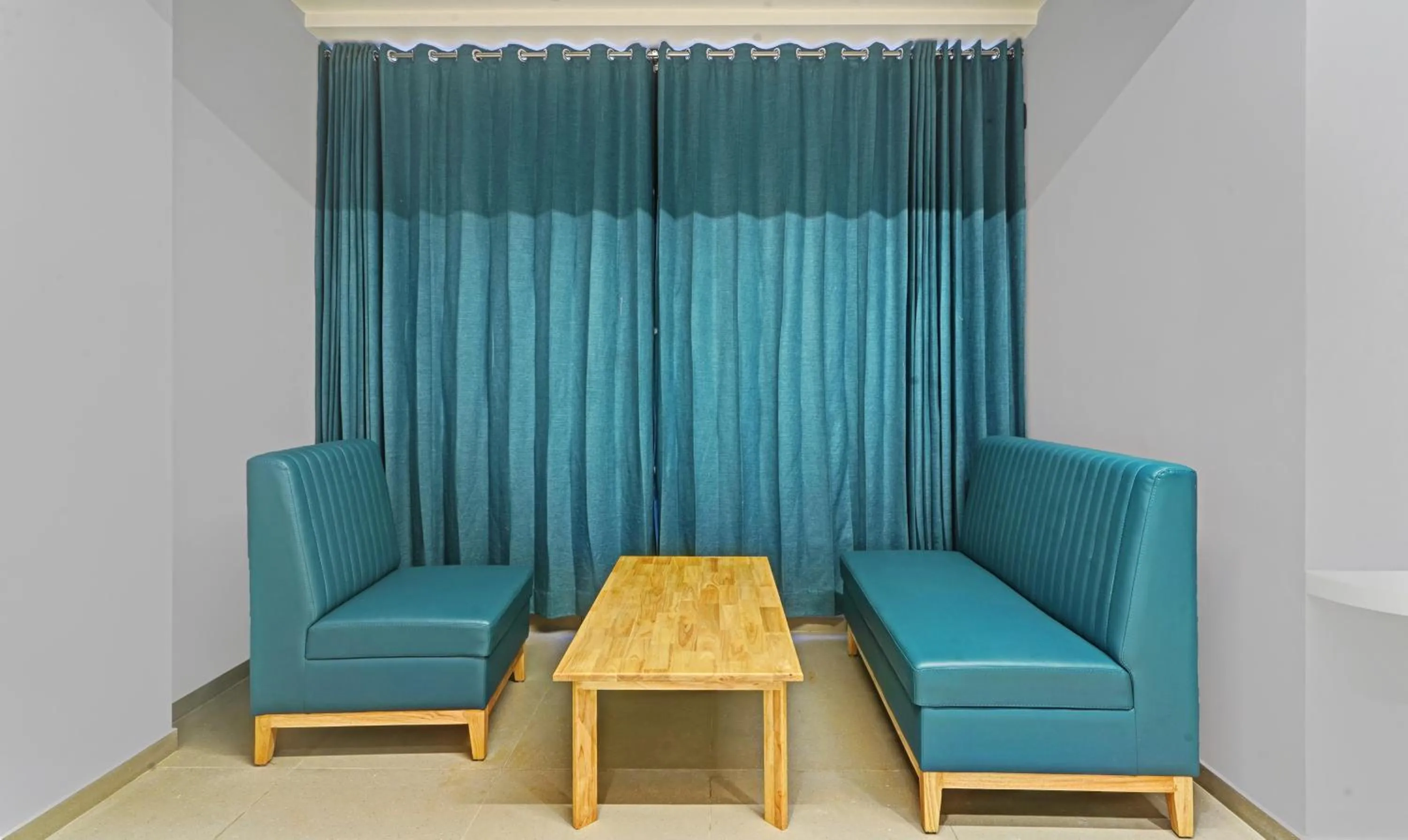 Seating area in Treebo Premium La Orchid, Big Temple