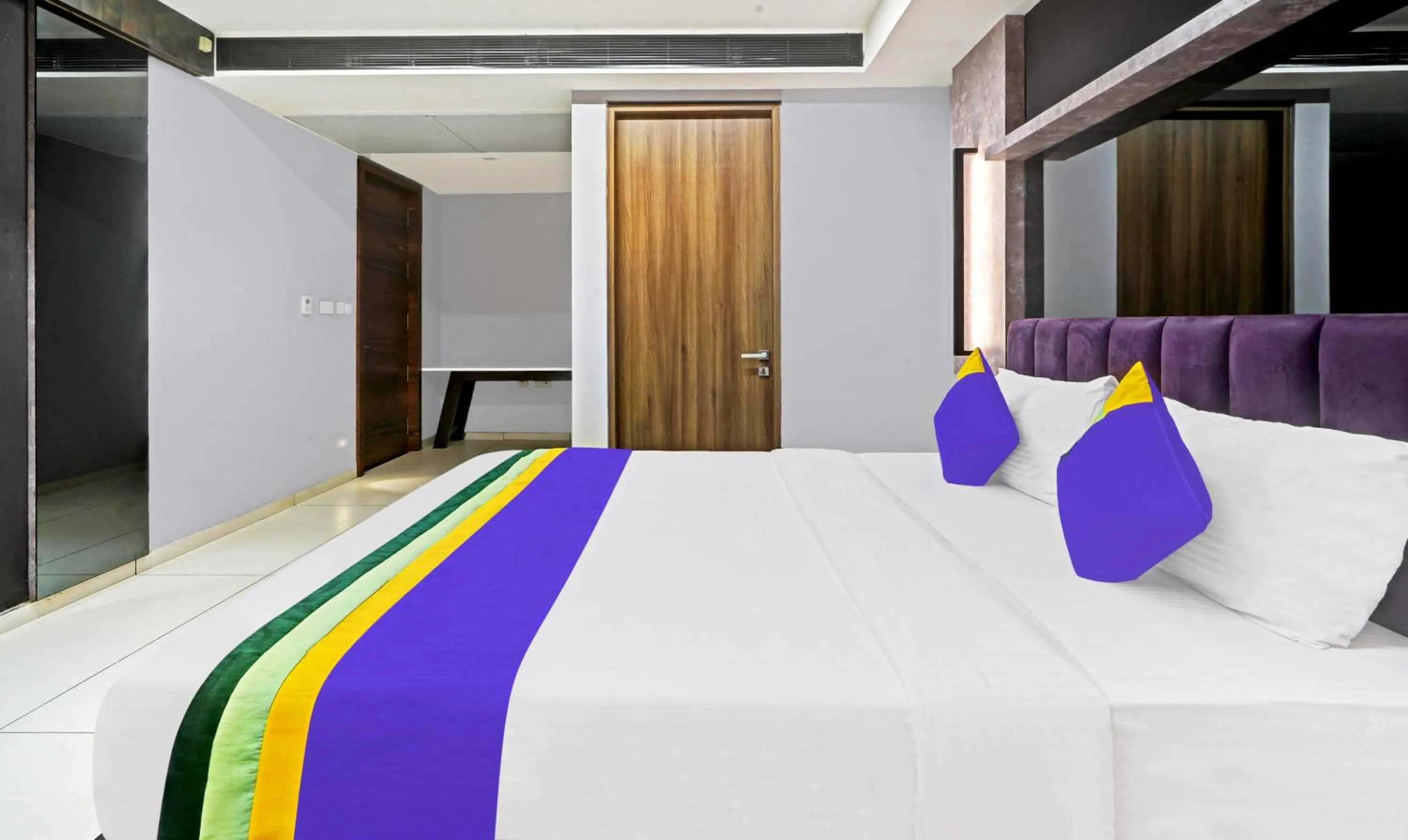 Bedroom, Bed in Treebo Premium La Orchid, Big Temple