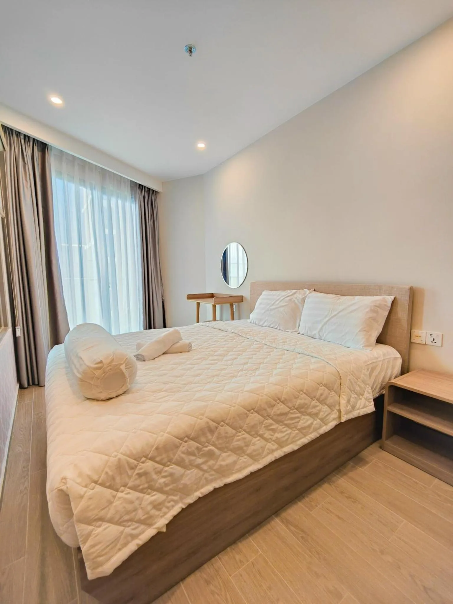 Bed in THE SÓNG CONDOTEL APARTMENT VŨNG TÀU