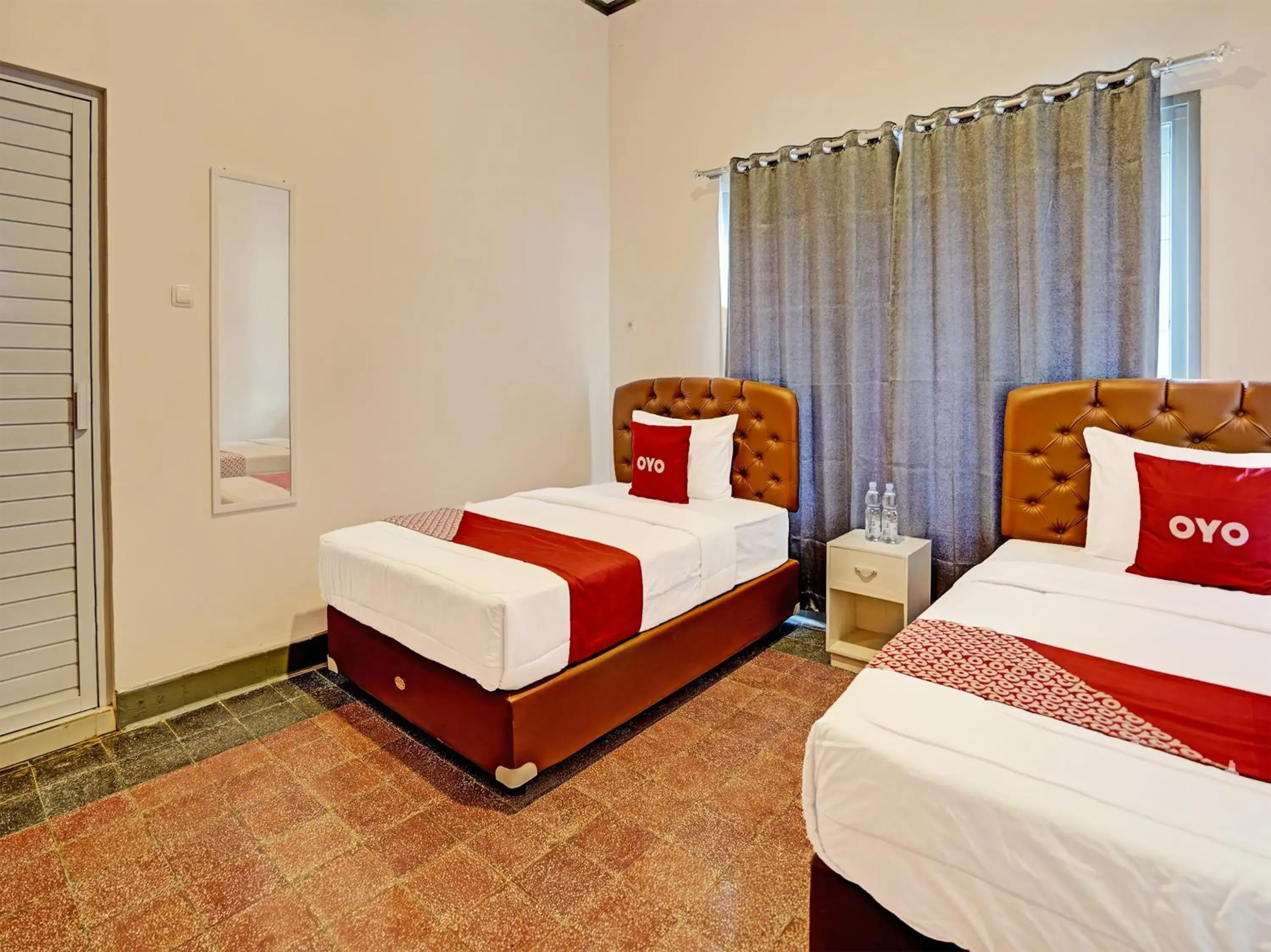 Delxue Twin Room in Hotel O Nawangwulan Delxue Twin Room in Hotel O Nawangwulan