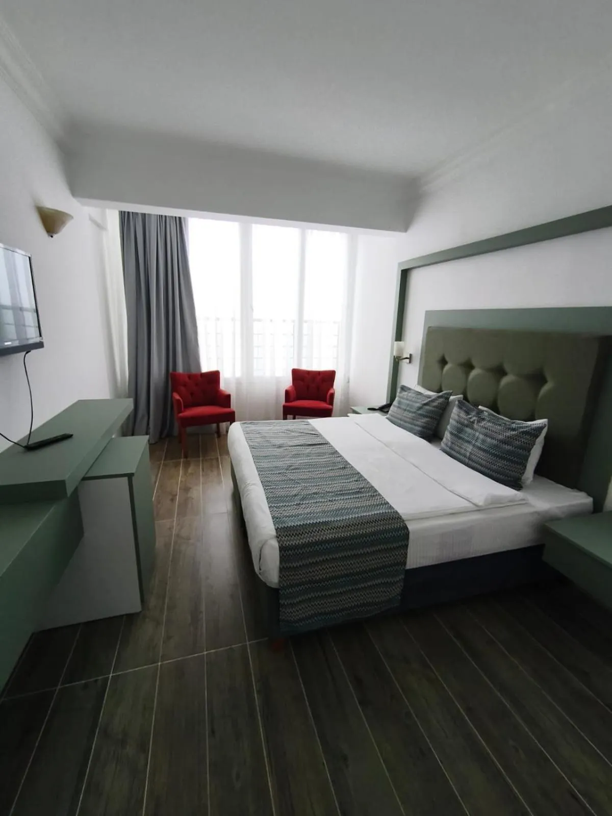 Bed in Sunport Hotel