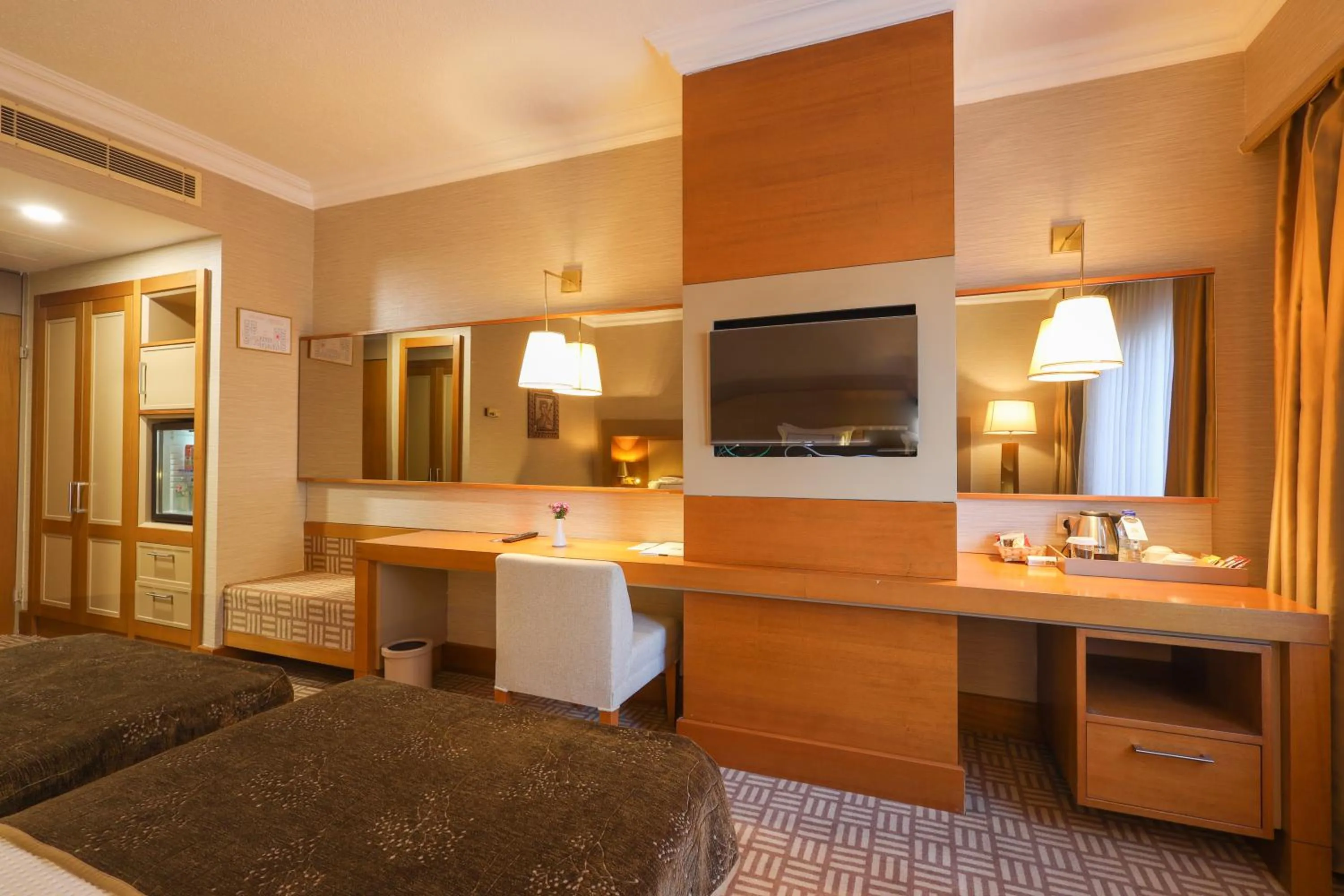 TV and multimedia, Bed in Tugcan Hotel