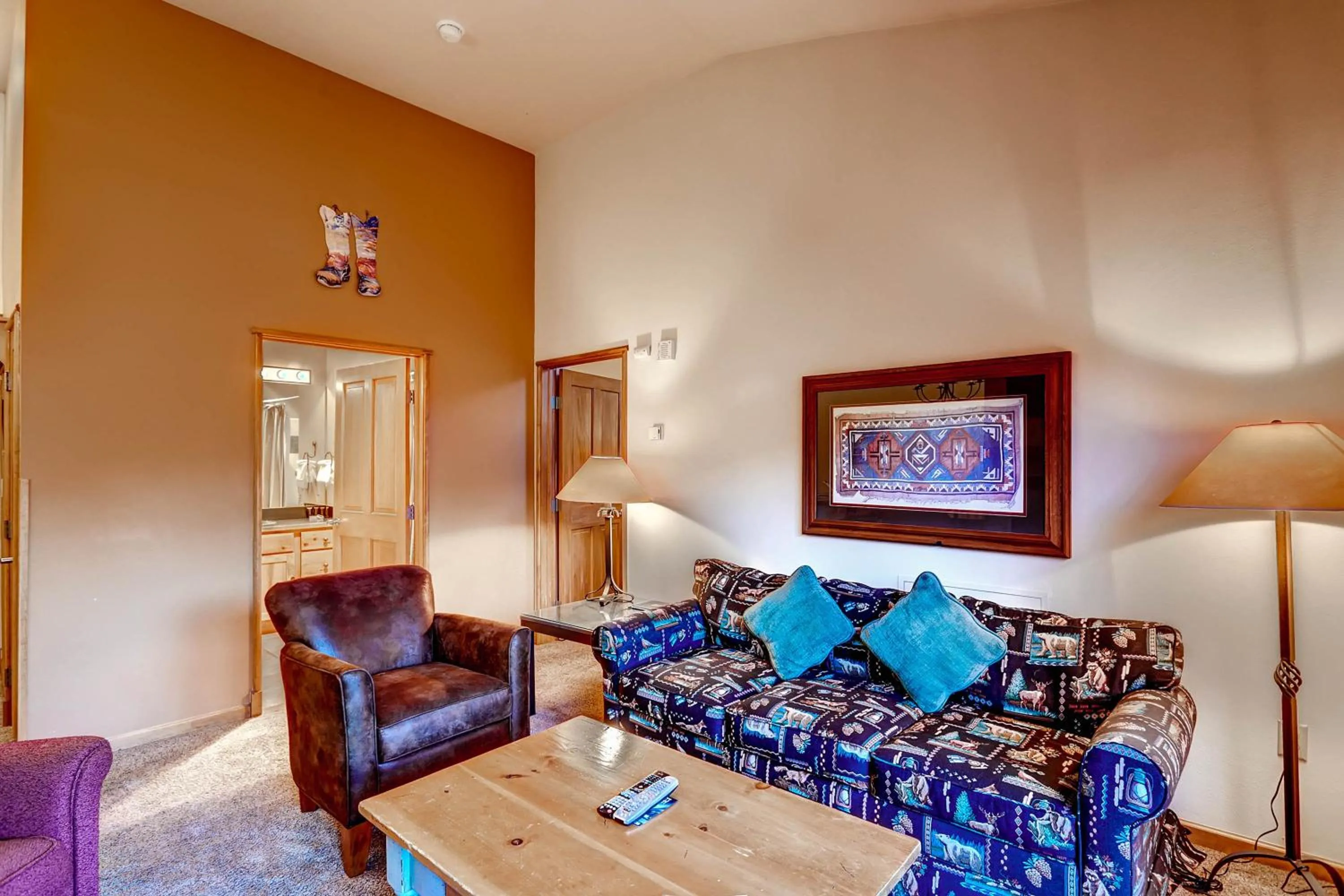 Living room, Bed in Jackpine & Black Bear Condominiums by Keystone Resort