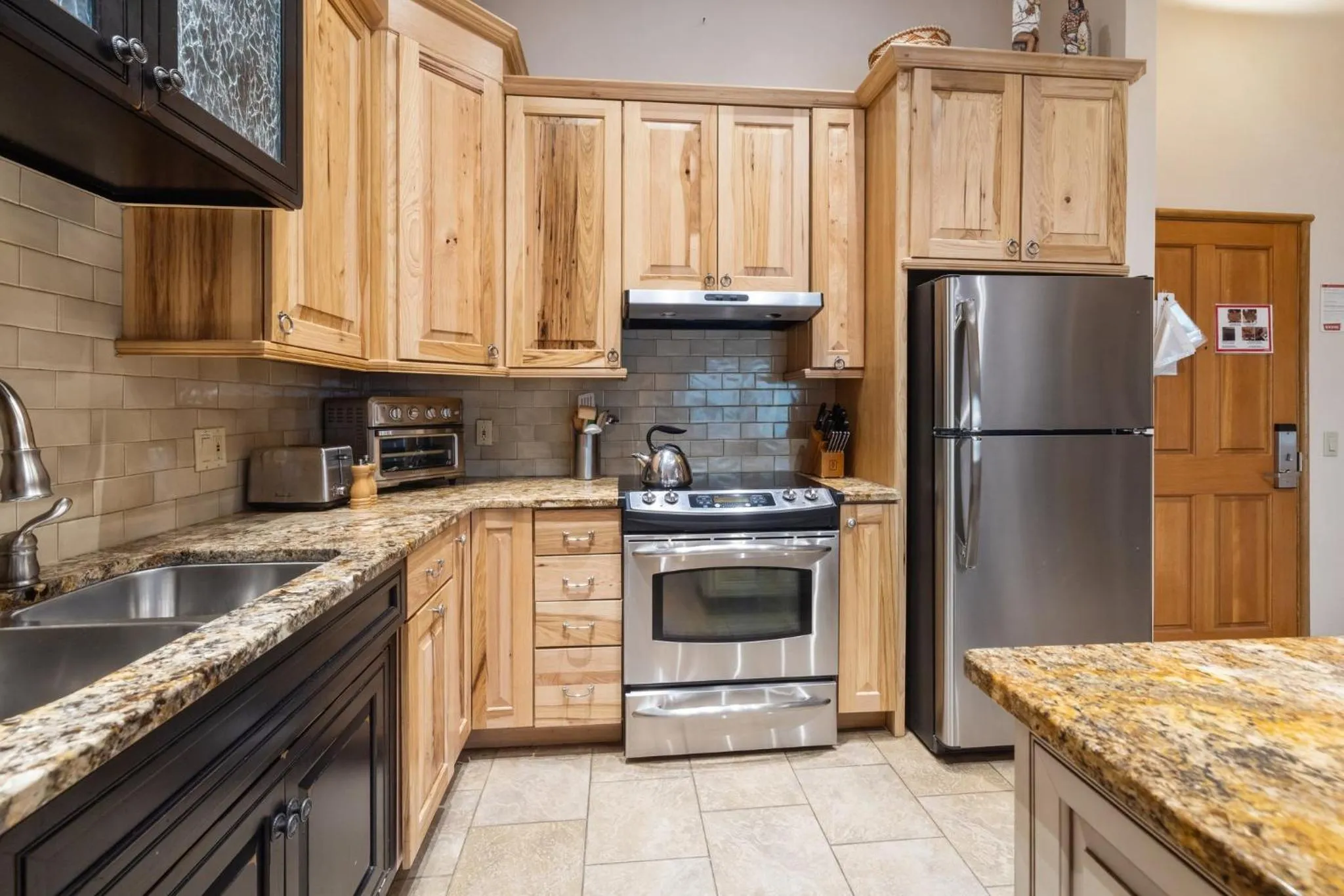 Communal kitchen in Jackpine & Black Bear Condominiums by Keystone Resort