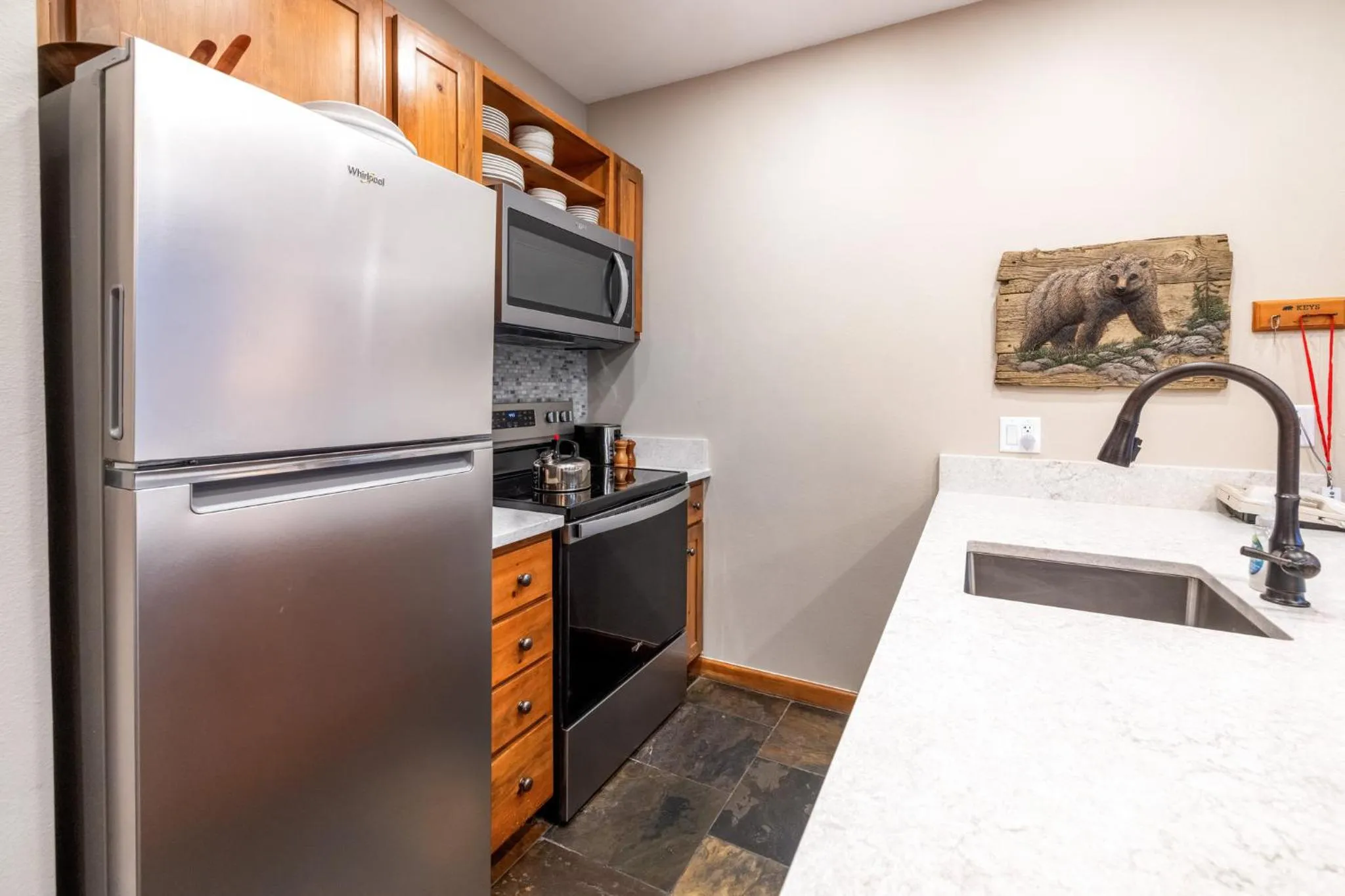Communal kitchen in Jackpine & Black Bear Condominiums by Keystone Resort