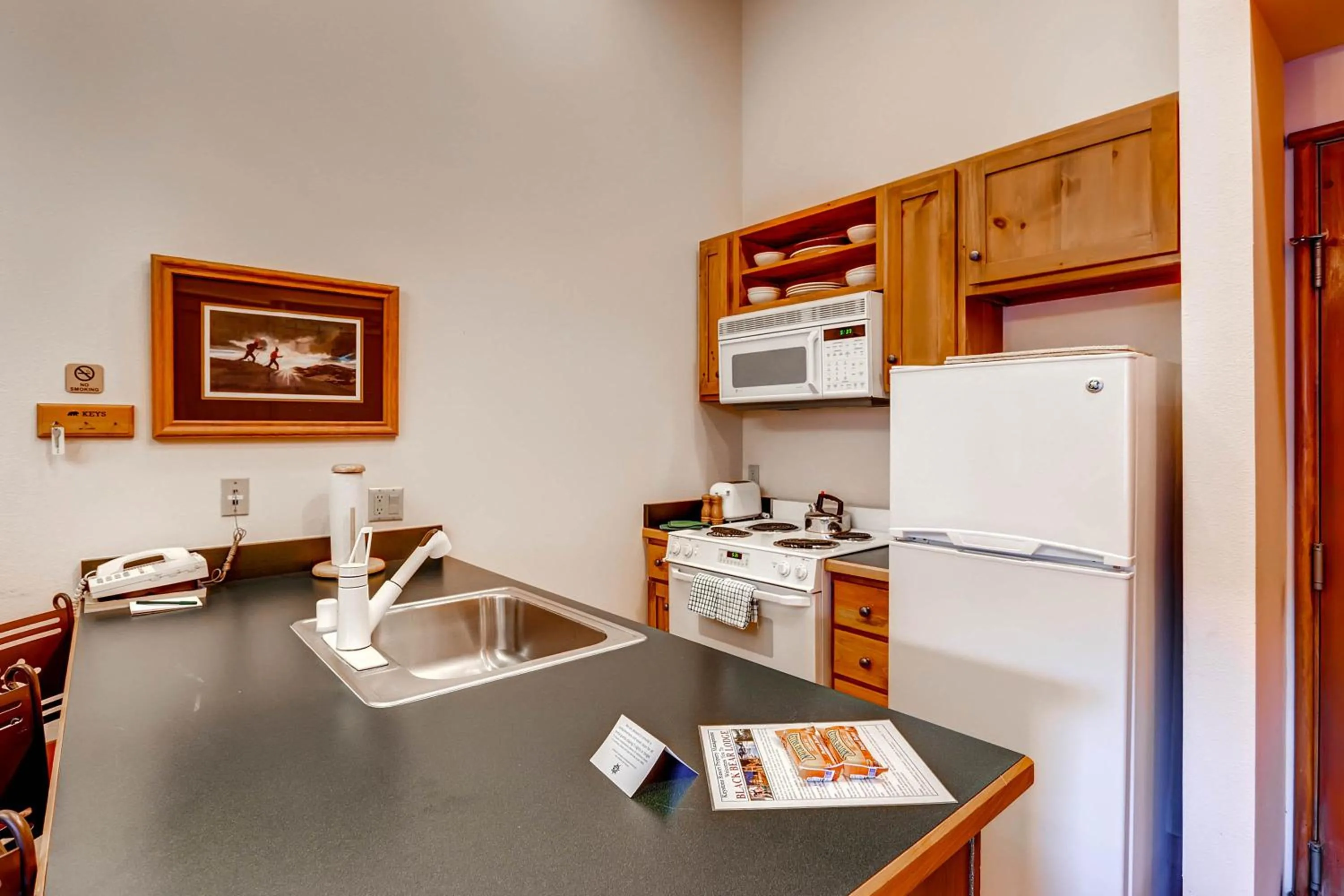 Kitchen or kitchenette in Jackpine & Black Bear Condominiums by Keystone Resort