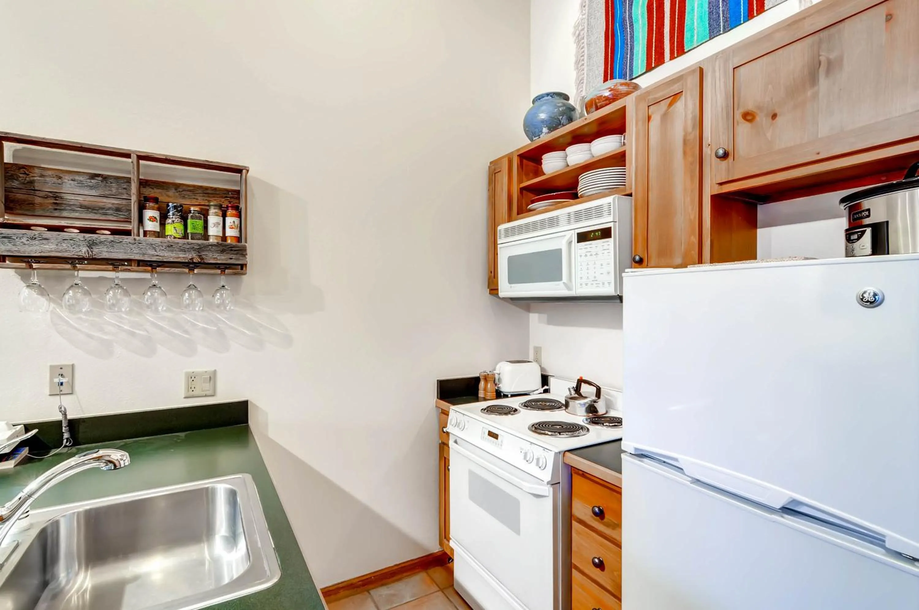 Kitchen or kitchenette in Jackpine & Black Bear Condominiums by Keystone Resort