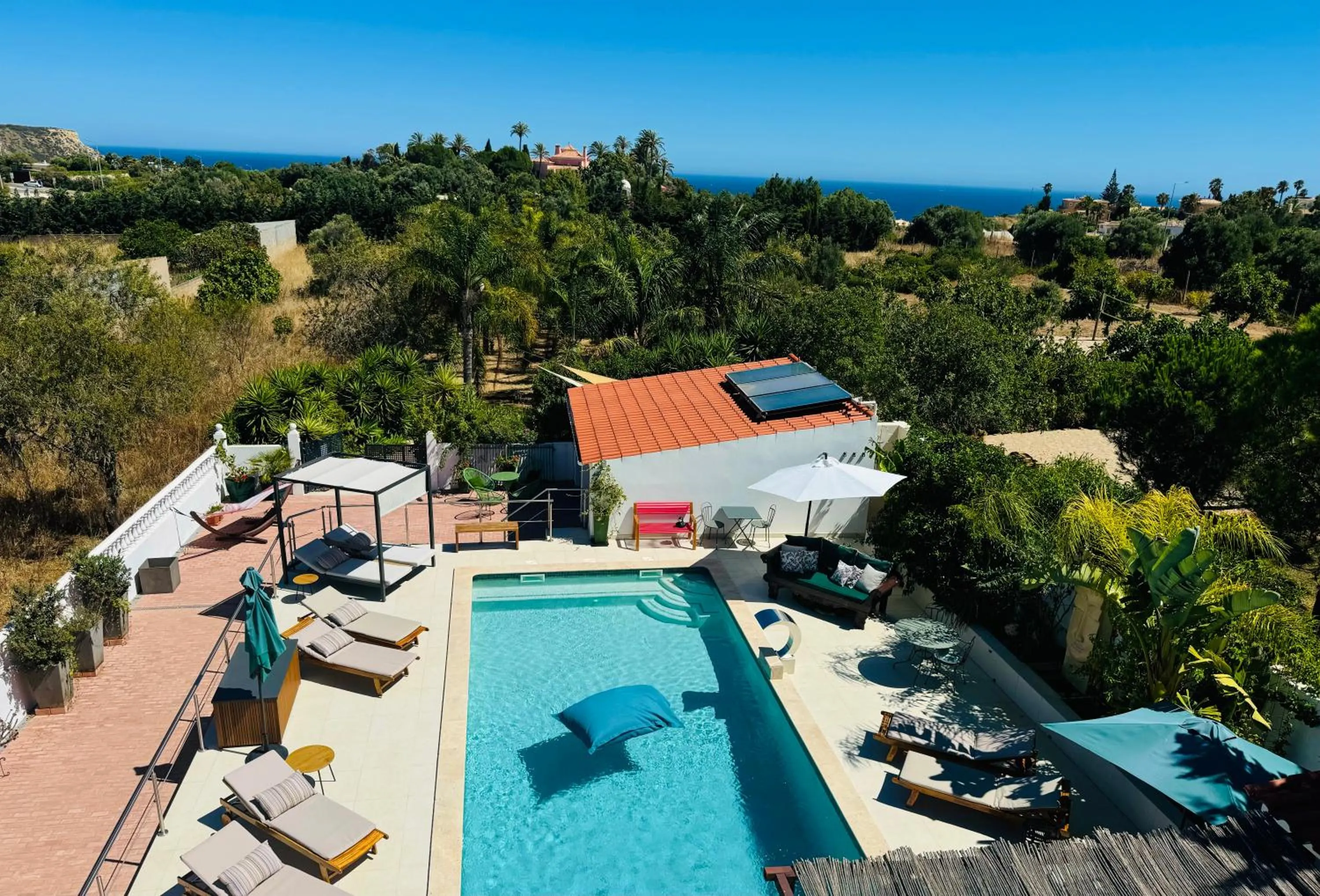 Swimming pool in Palm View Guesthouse, adults only