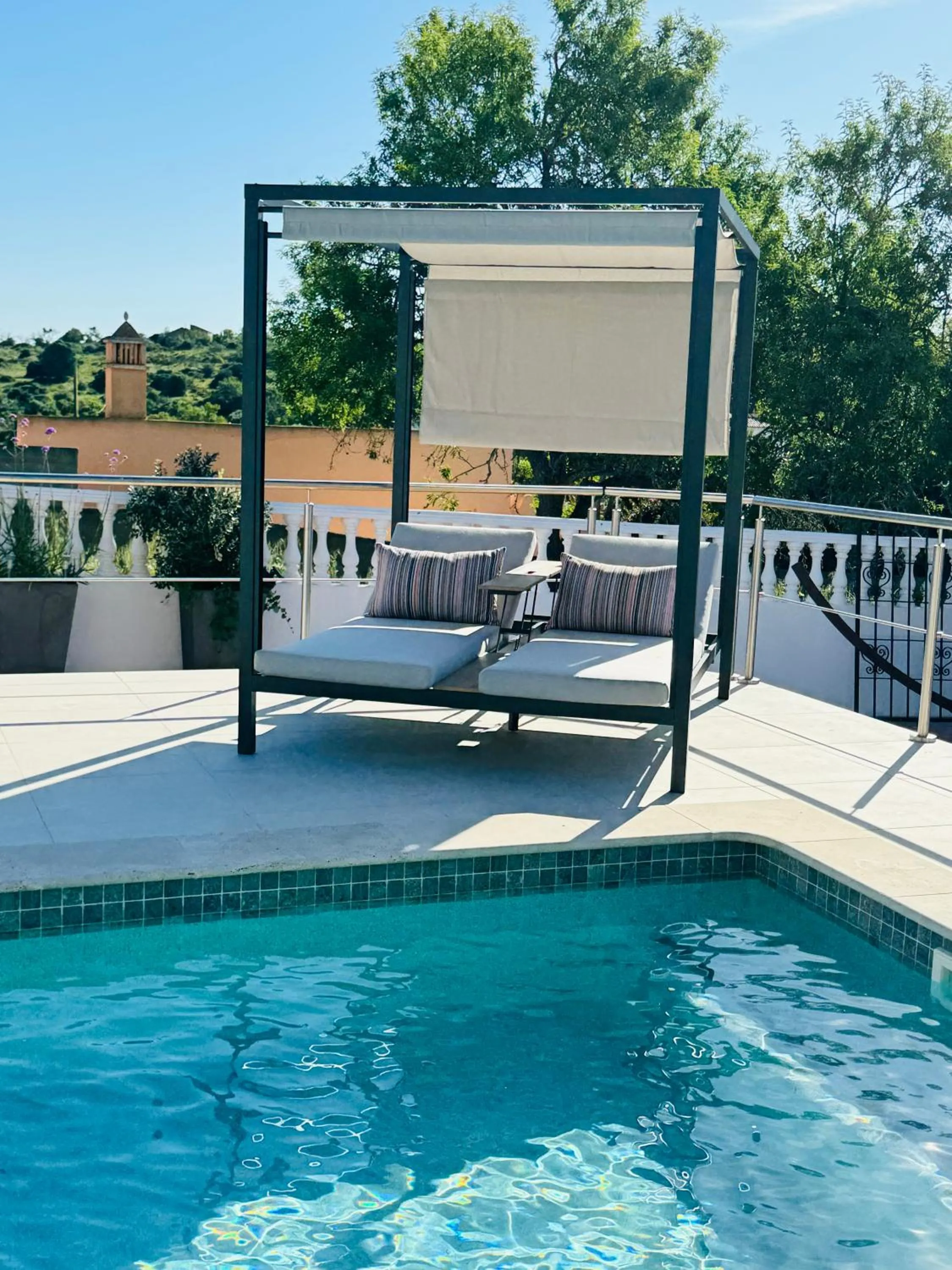 Swimming pool in Palm View Guesthouse, adults only