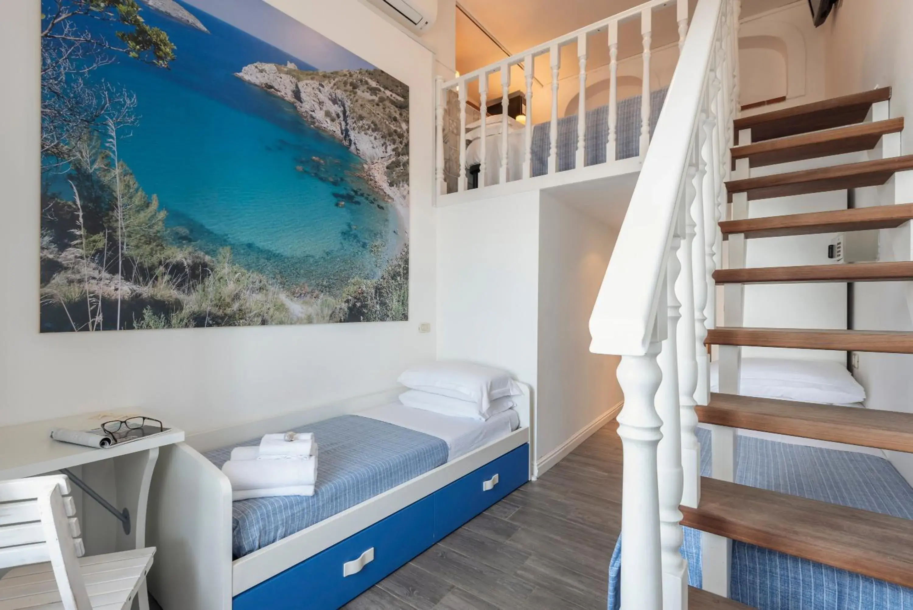 Quadruple Room with Sea View - Split Level in Hotel La Caletta Quadruple Room with Sea View - Split Level in Hotel La Caletta