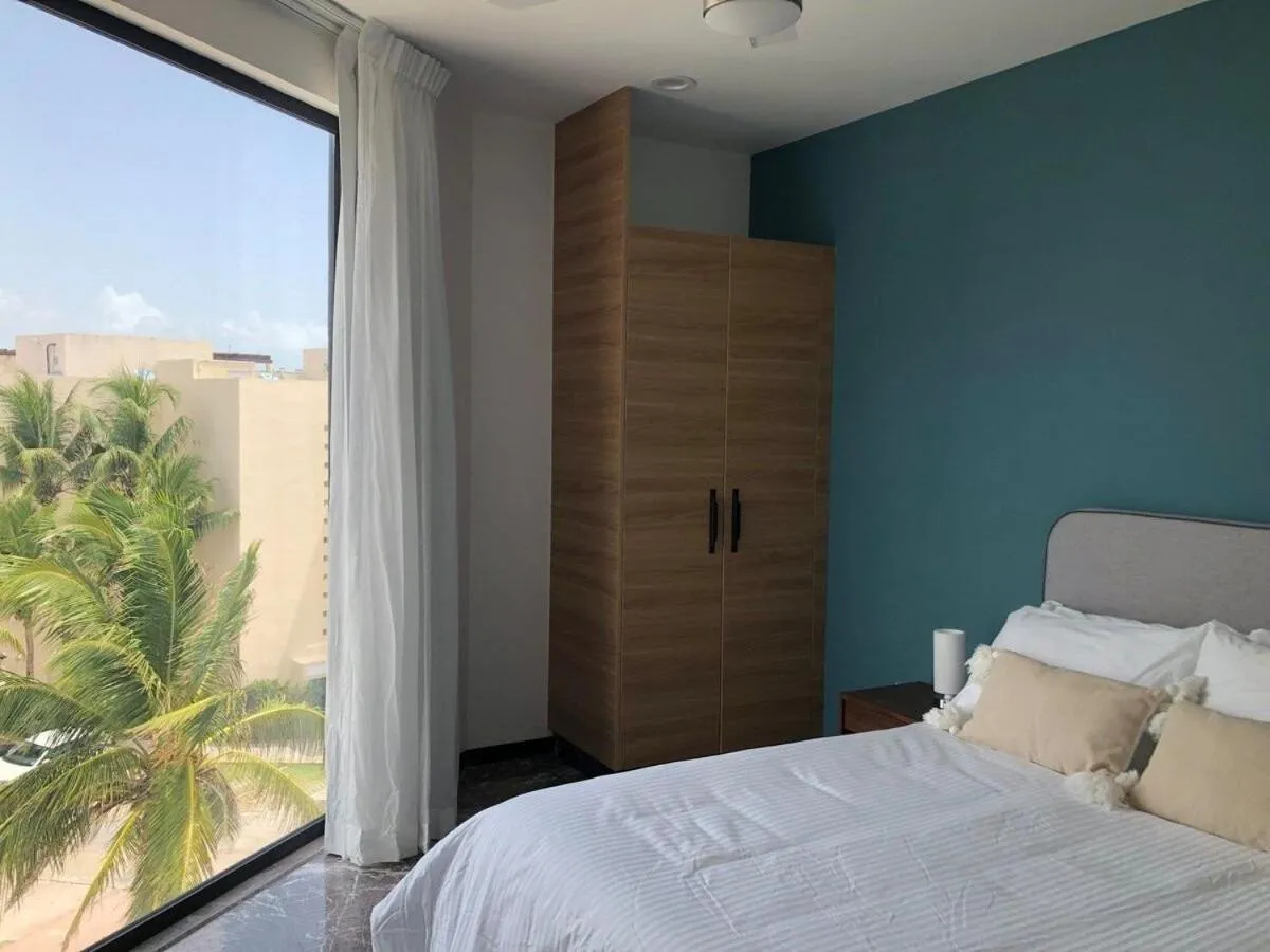 Bed in Deluxe Aparment Whit Beach & Ocean View 8 Pax