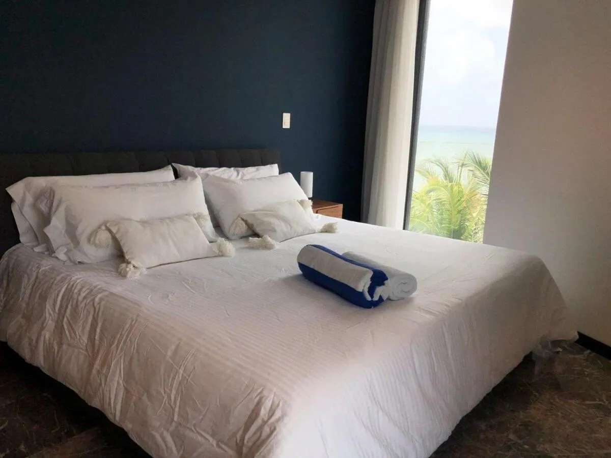 Bed in Deluxe Aparment Whit Beach & Ocean View 8 Pax