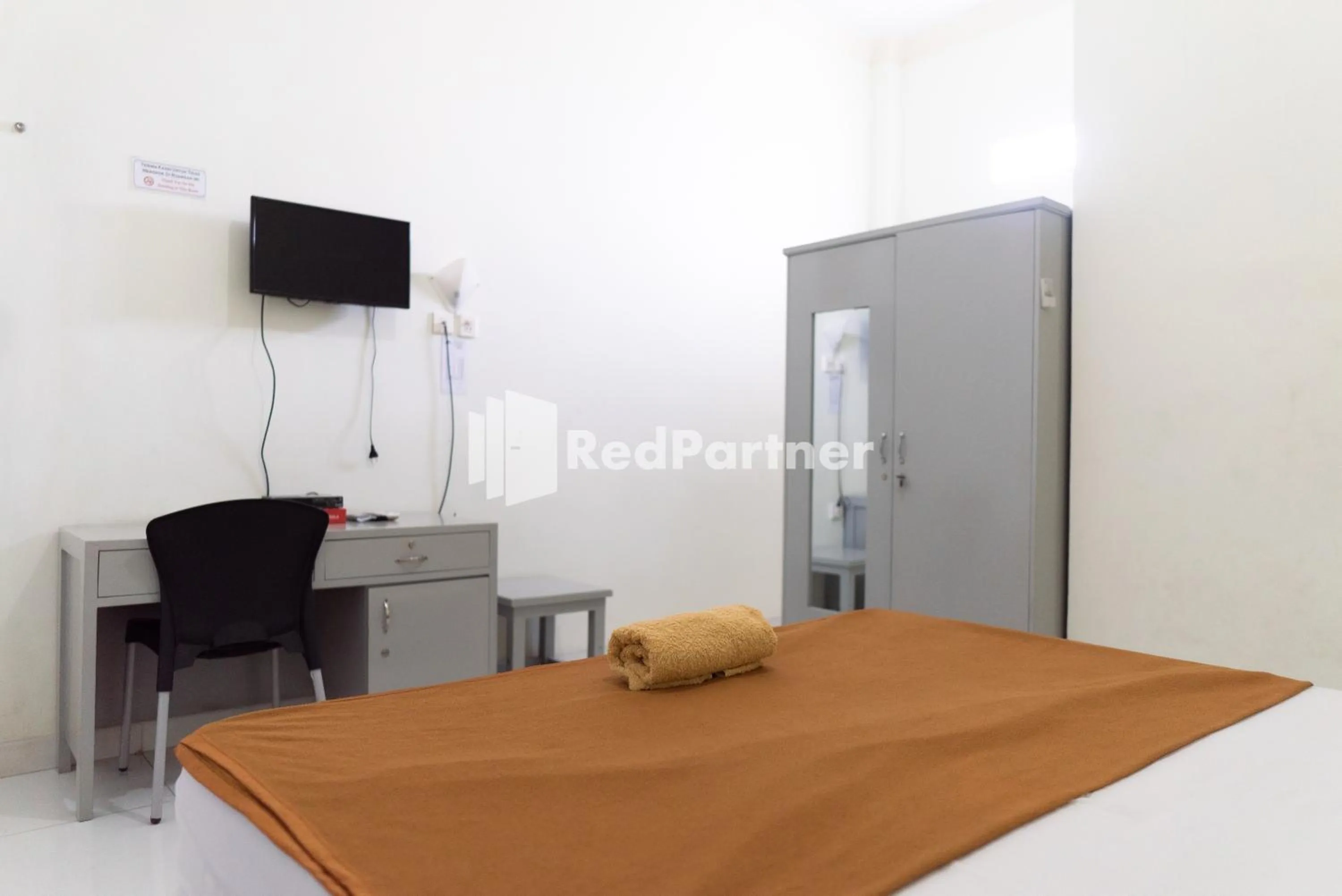 Bedroom in Wisma Aini Syariah Lampung Mitra RedDoorz