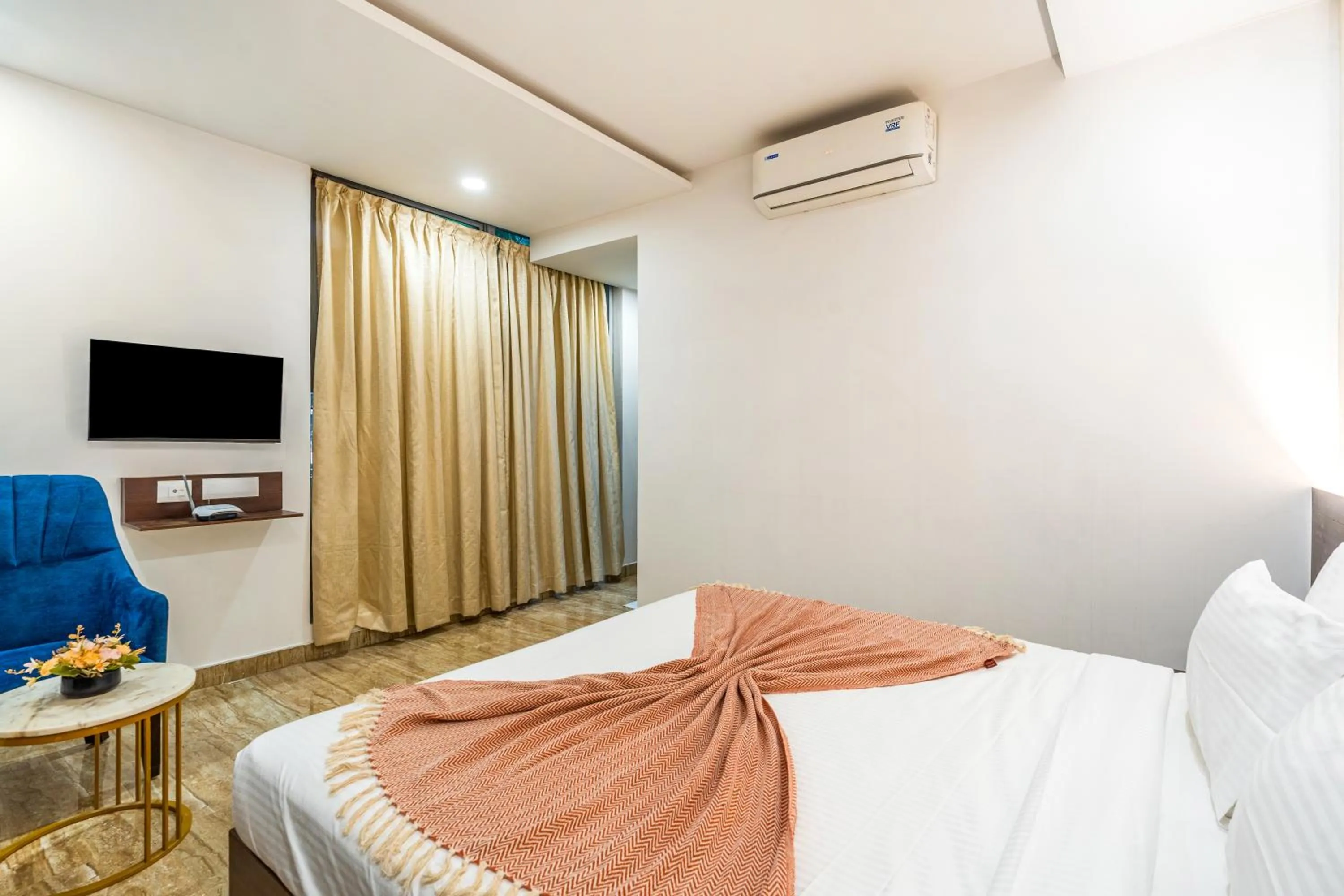 Photo of the whole room, Bed in Bangalore Times by Alaya Stays