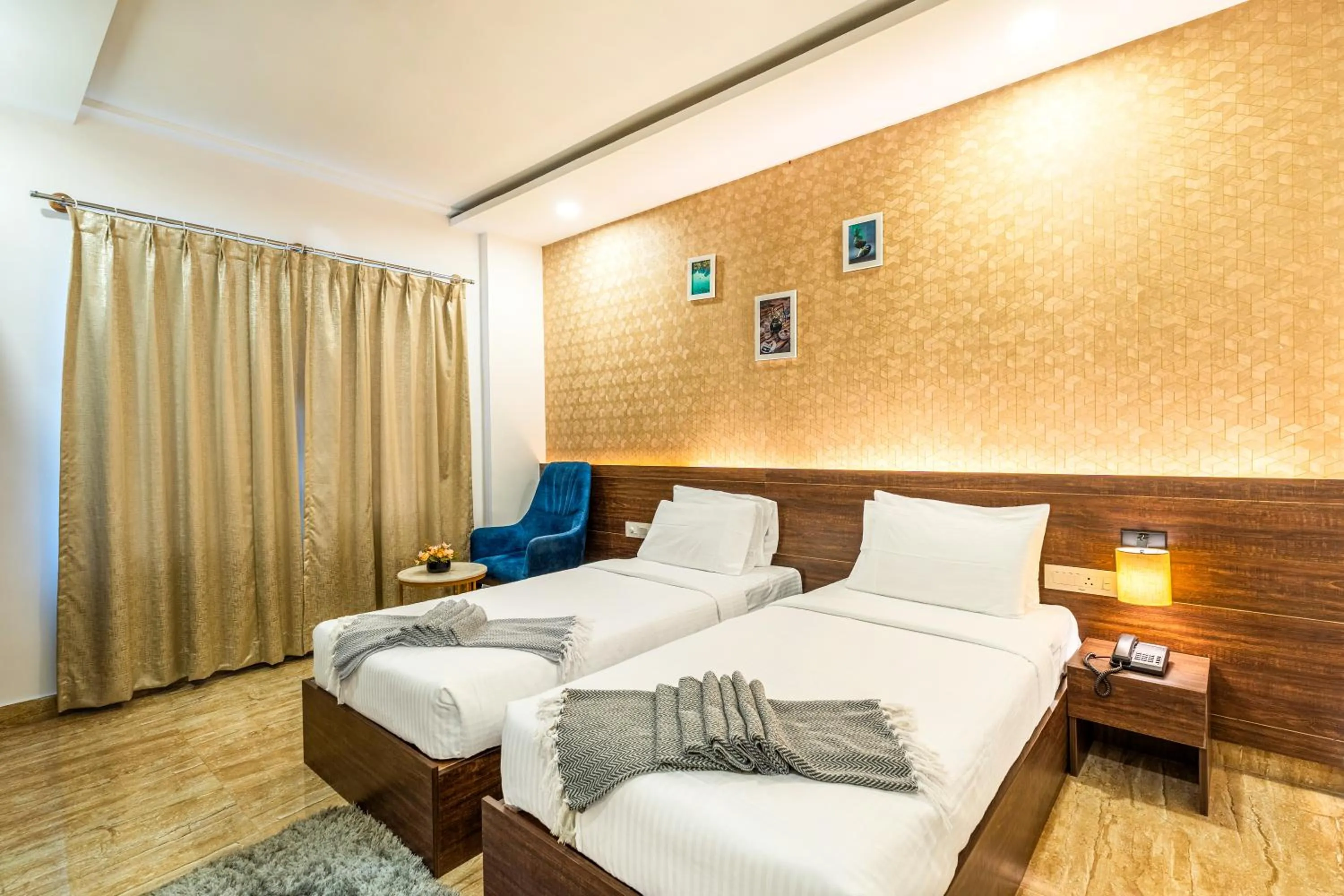 Photo of the whole room, Bed in Bangalore Times by Alaya Stays