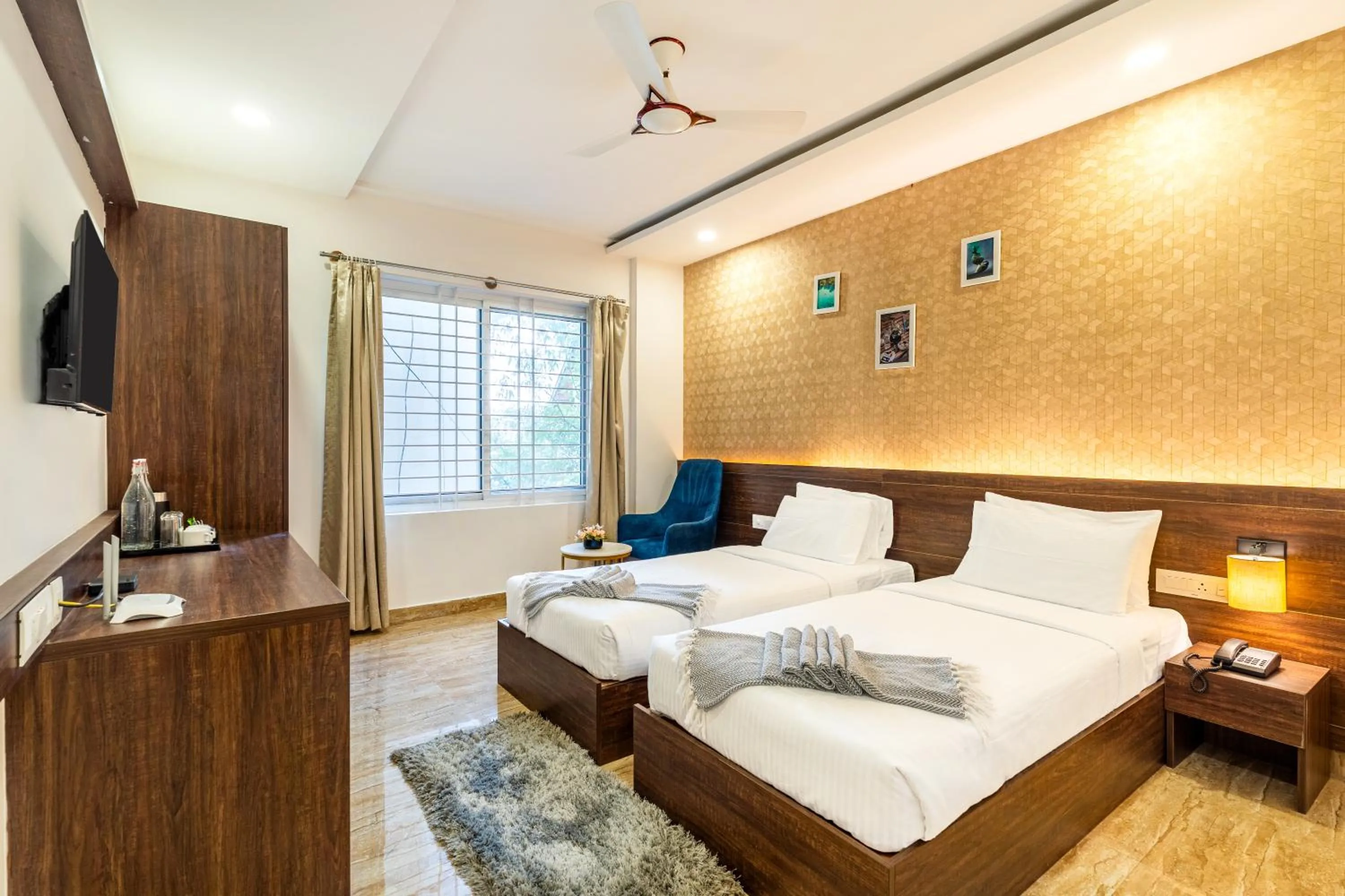 Photo of the whole room, Bed in Bangalore Times by Alaya Stays