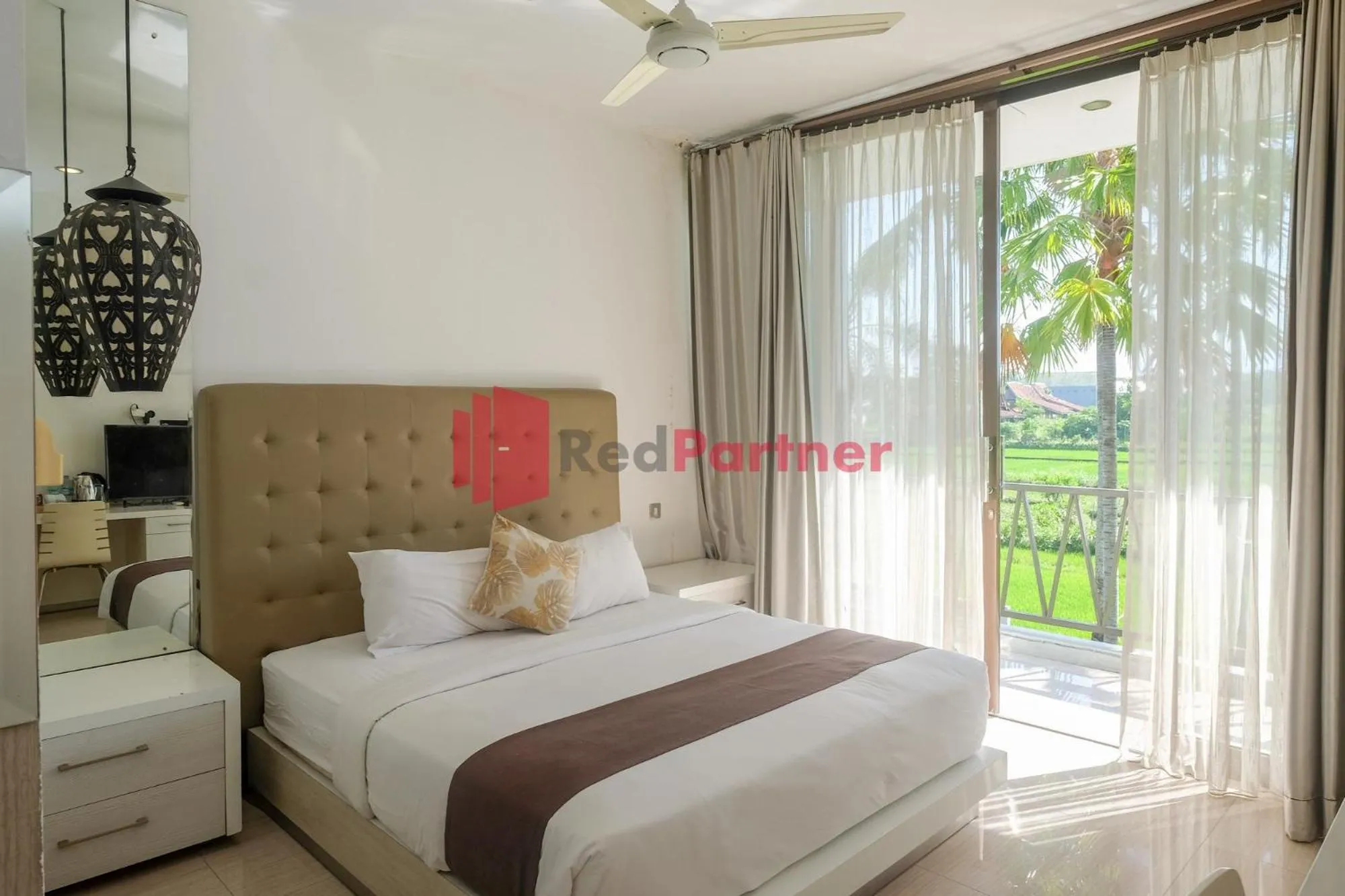 Bed in Sawah Joglo Boutique Villa Mitra RedDoorz