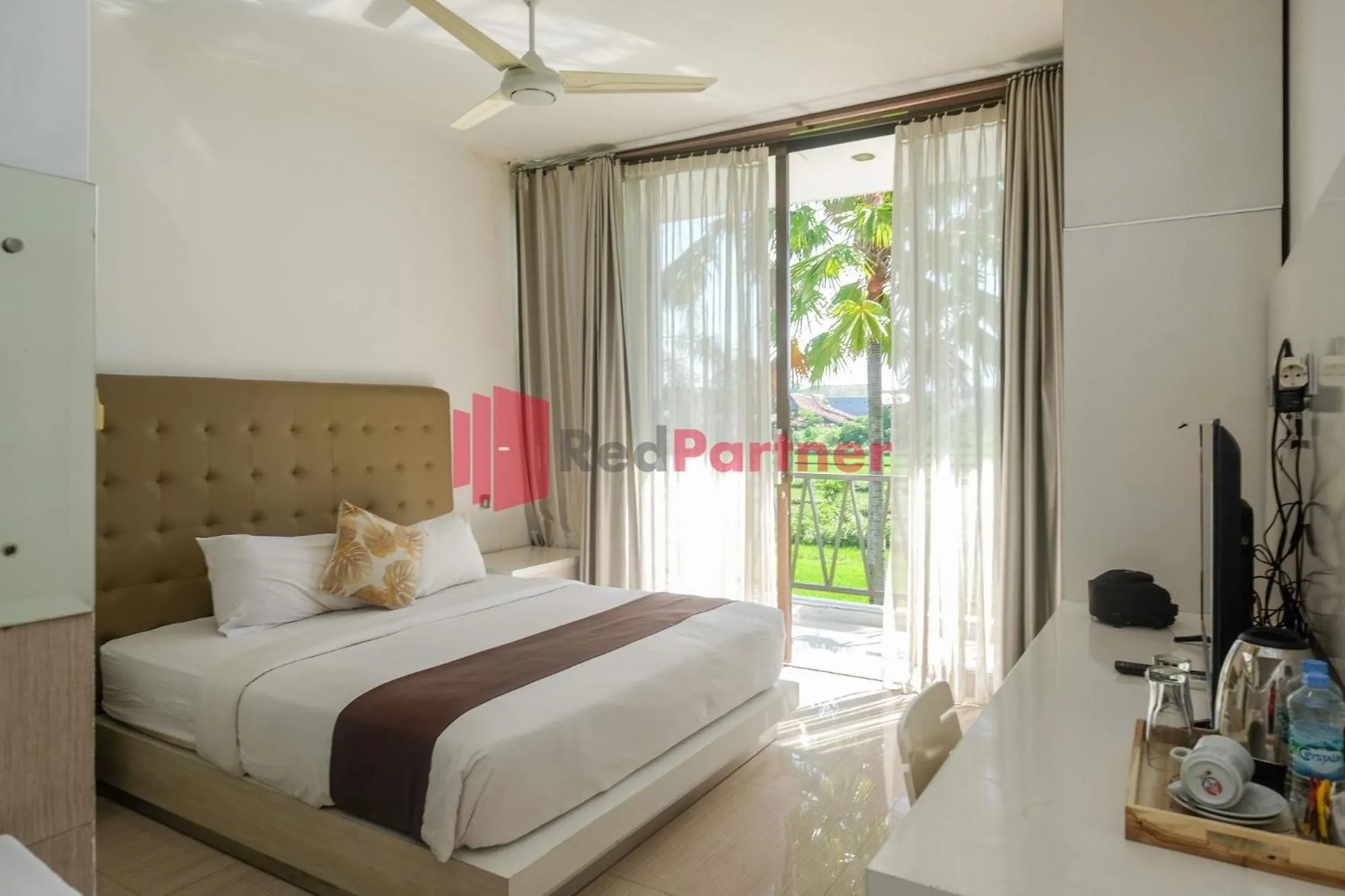 Bed in Sawah Joglo Boutique Villa Mitra RedDoorz