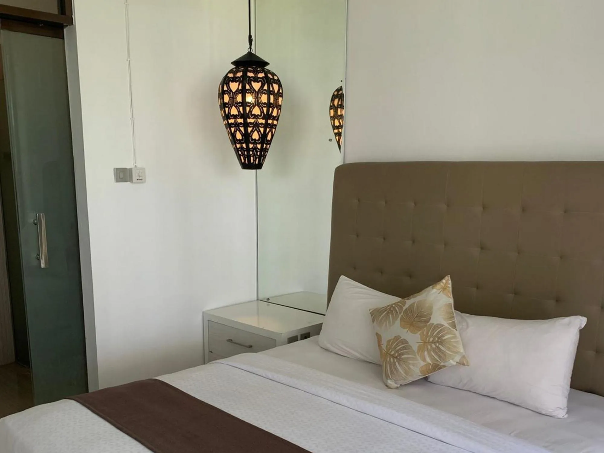 Bed in Sawah Joglo Boutique Villa Mitra RedDoorz