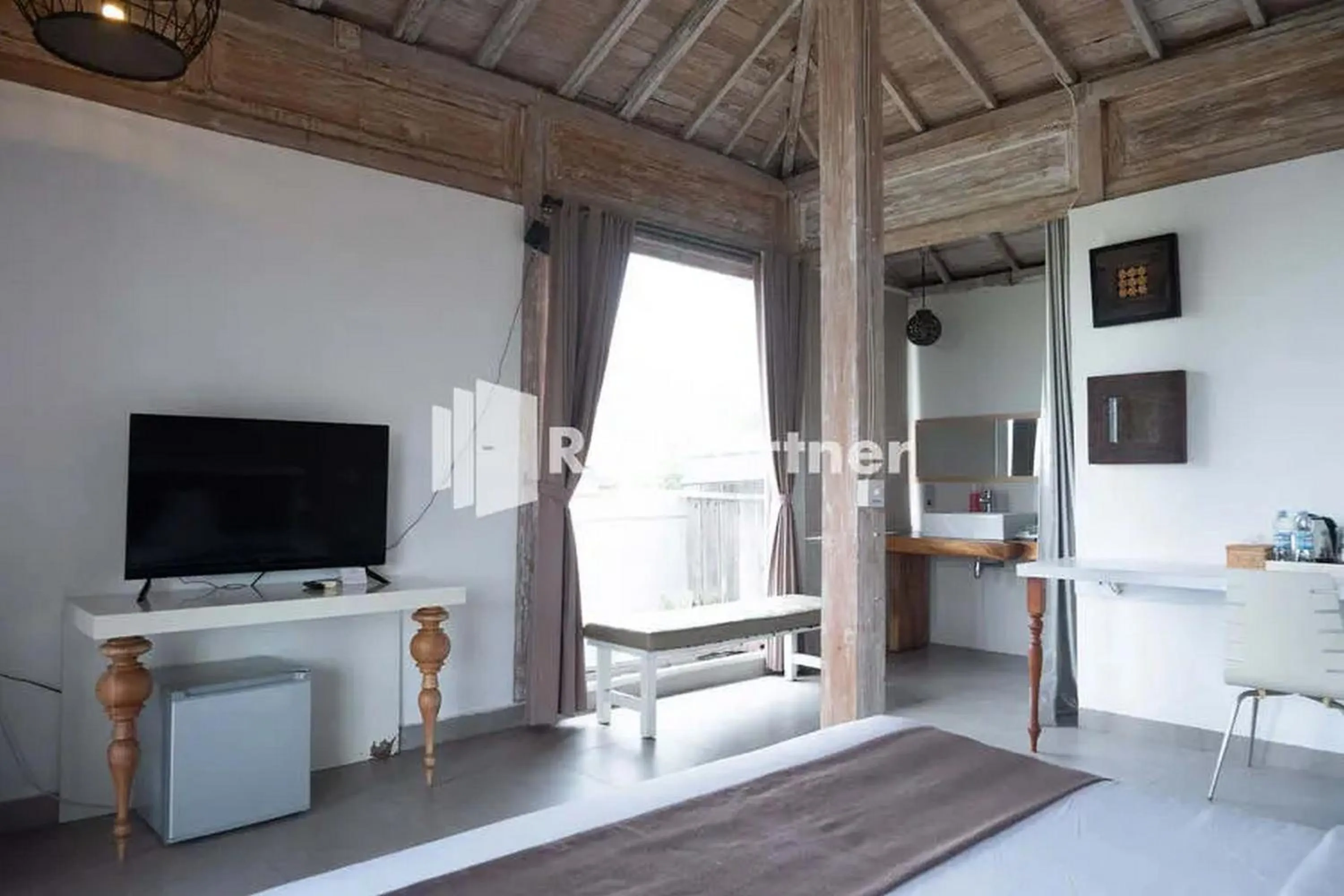 TV and multimedia in Sawah Joglo Boutique Villa Mitra RedDoorz