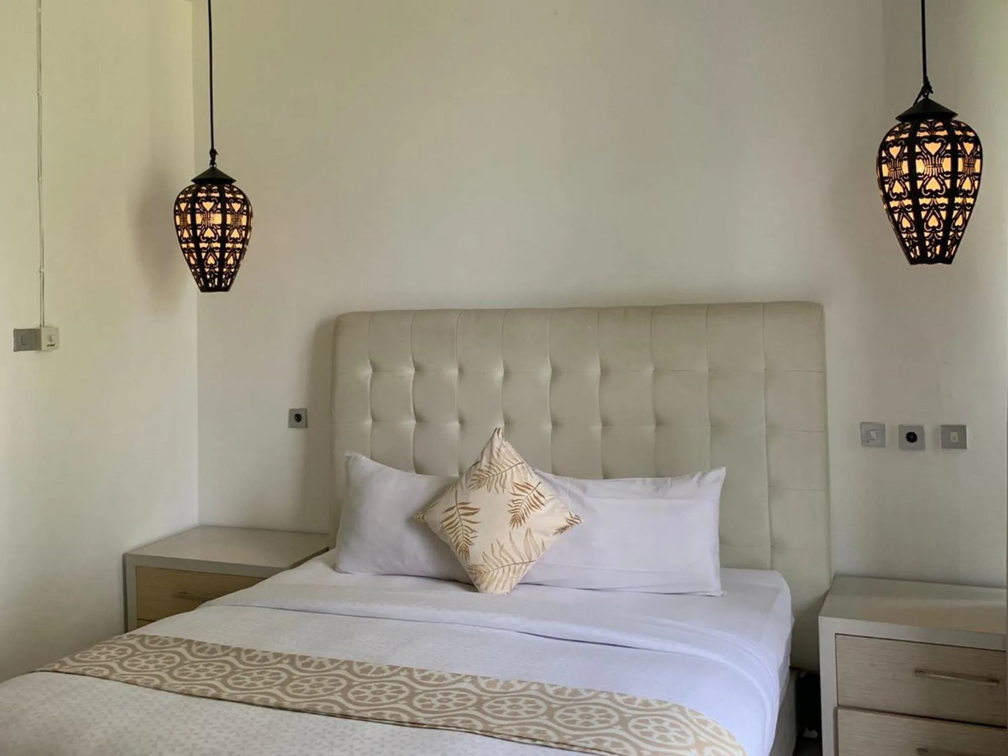 Bed in Sawah Joglo Boutique Villa Mitra RedDoorz