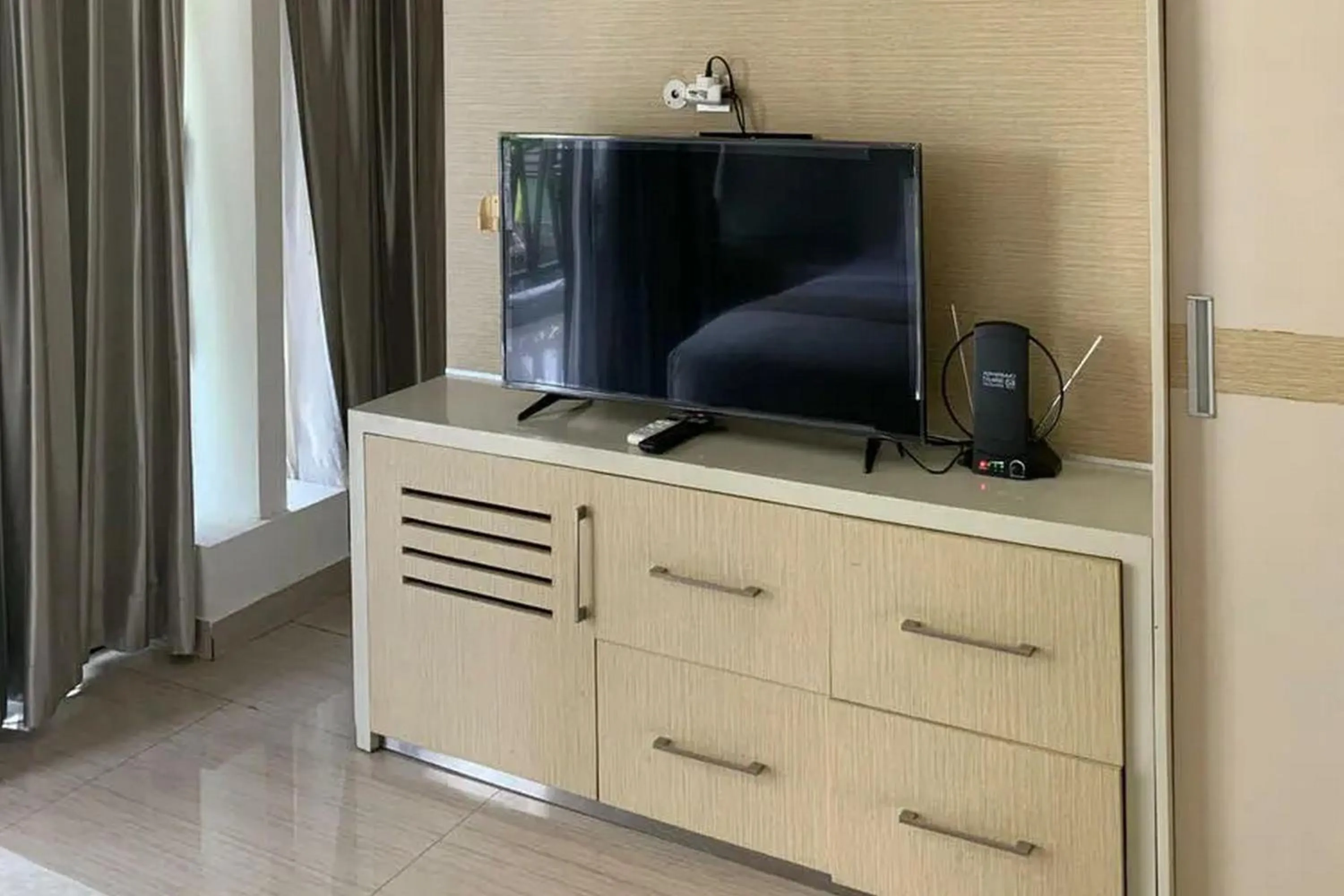 TV and multimedia in Sawah Joglo Boutique Villa Mitra RedDoorz