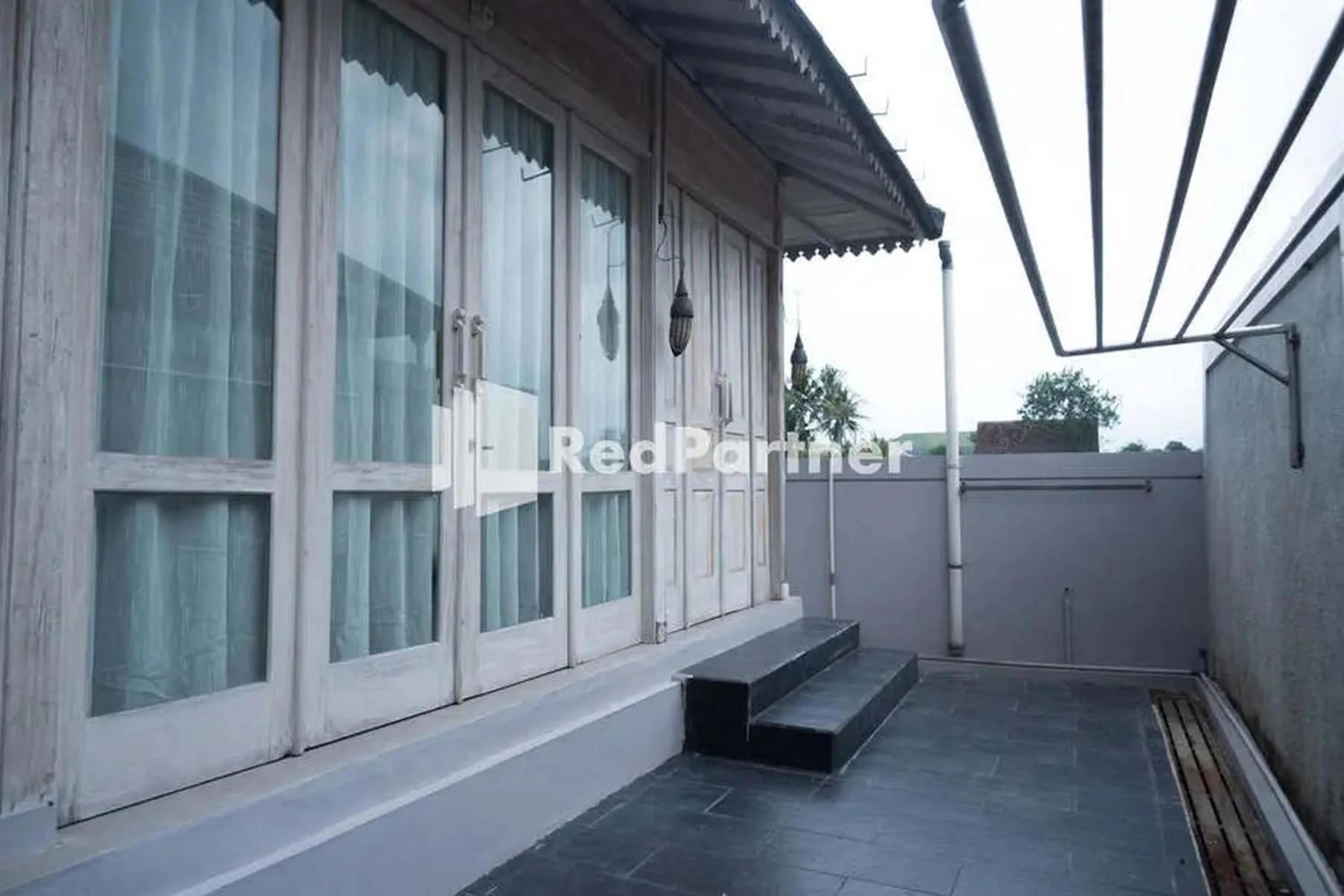 Balcony/Terrace in Sawah Joglo Boutique Villa Mitra RedDoorz